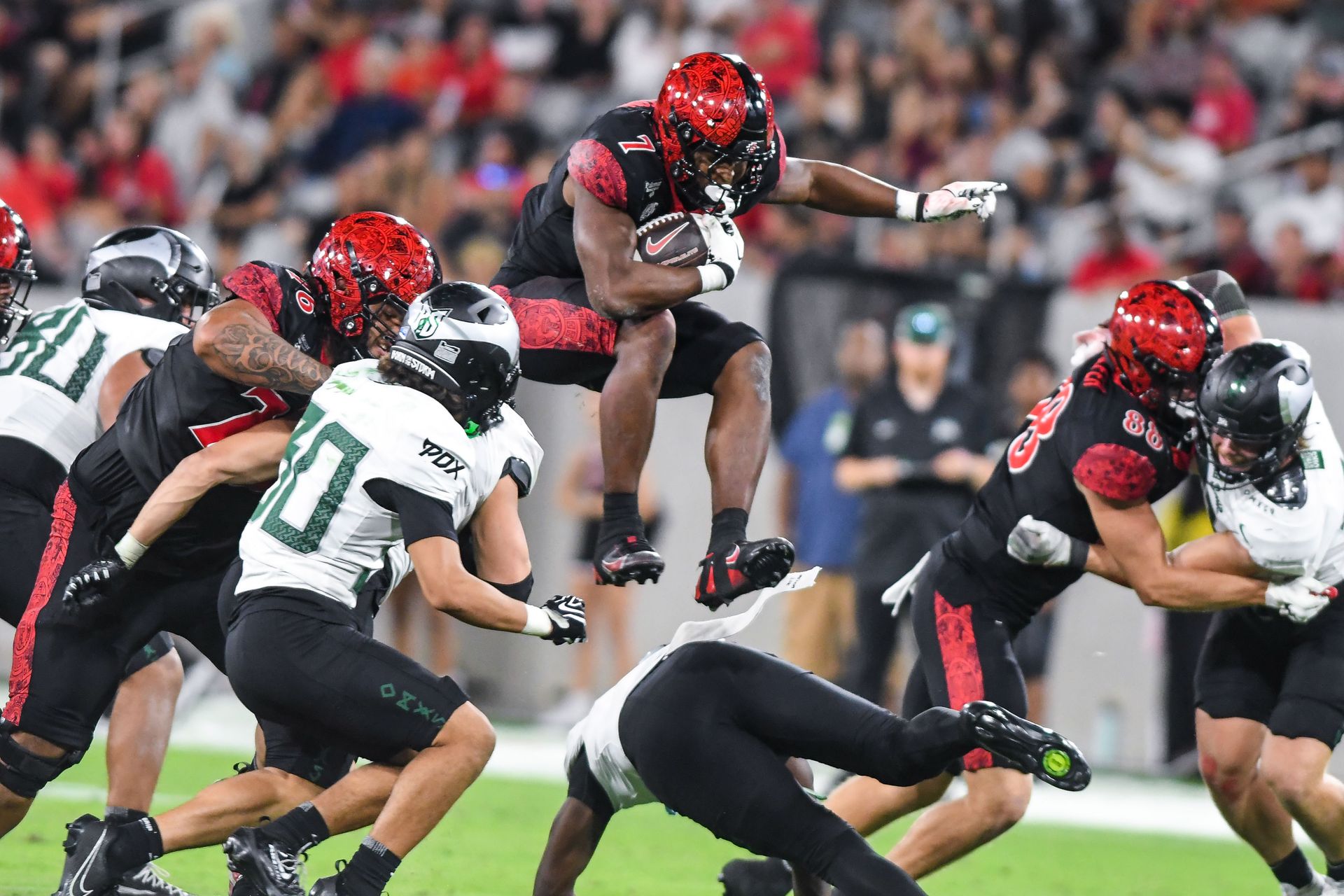 Lucky Sutton hurdles a defender, scores for SDSU