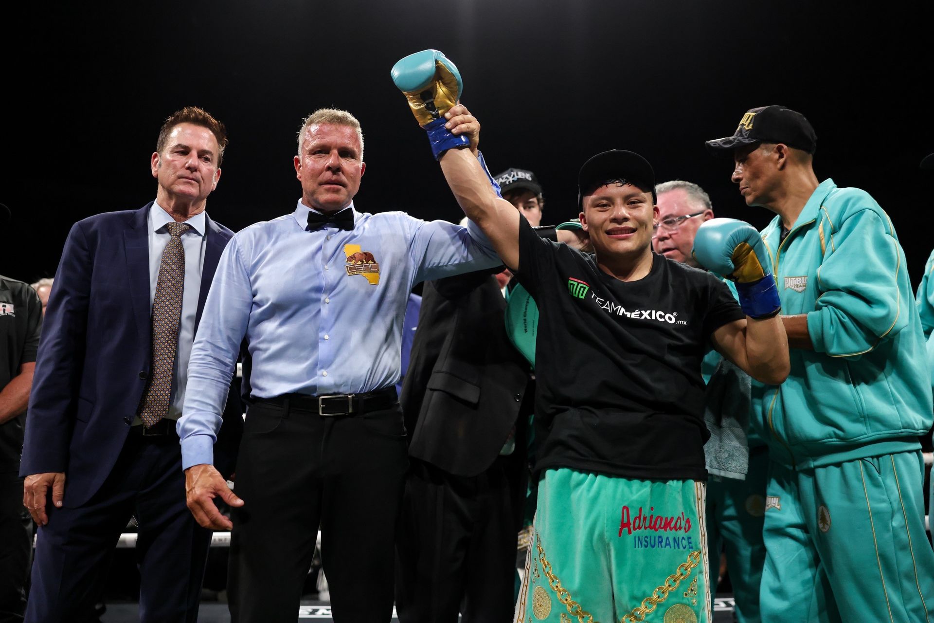 Victorious Cruz holds his title after defeating Bravo