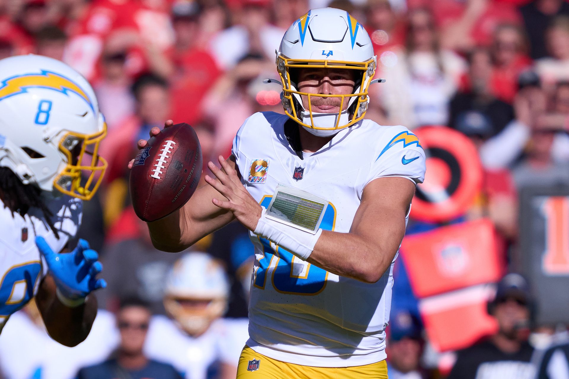 Justin Herbert delivers a pass against the Kansas City Chiefs