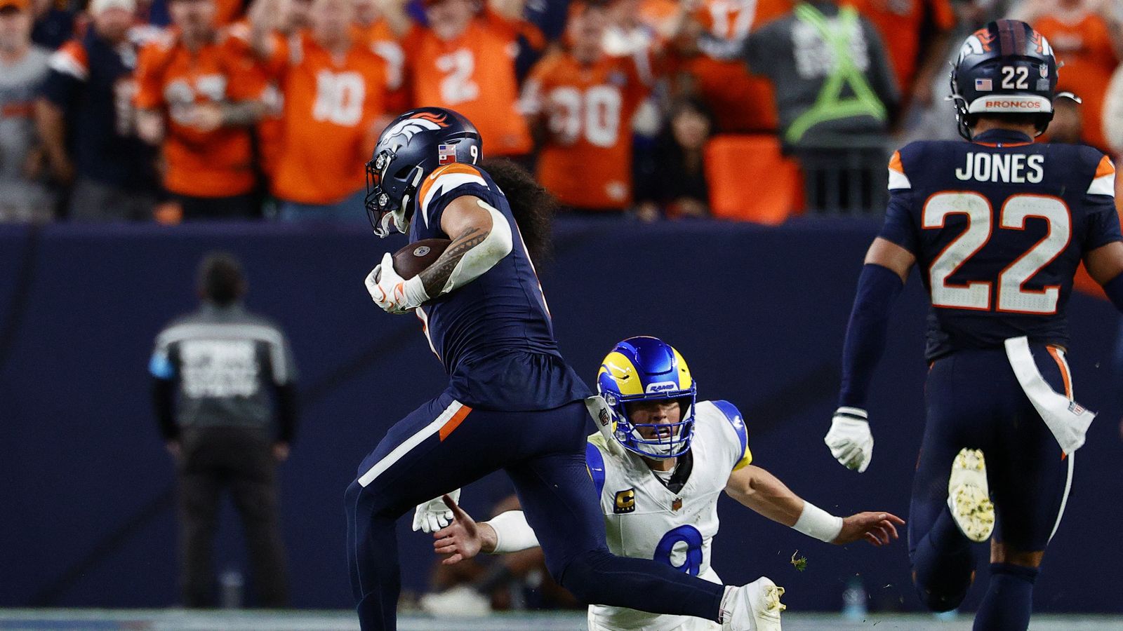 Talanoa Hufanga scores a touchdown post-interception, Sep 27, 2026