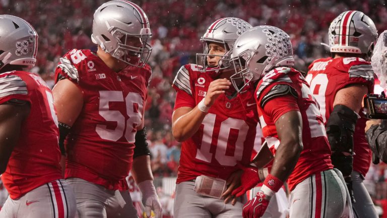 Ohio State Buckeyes quarterback Julian Sayin (10) celebrates a touchdown run by running back Bo Jackson (25) during the NCAA