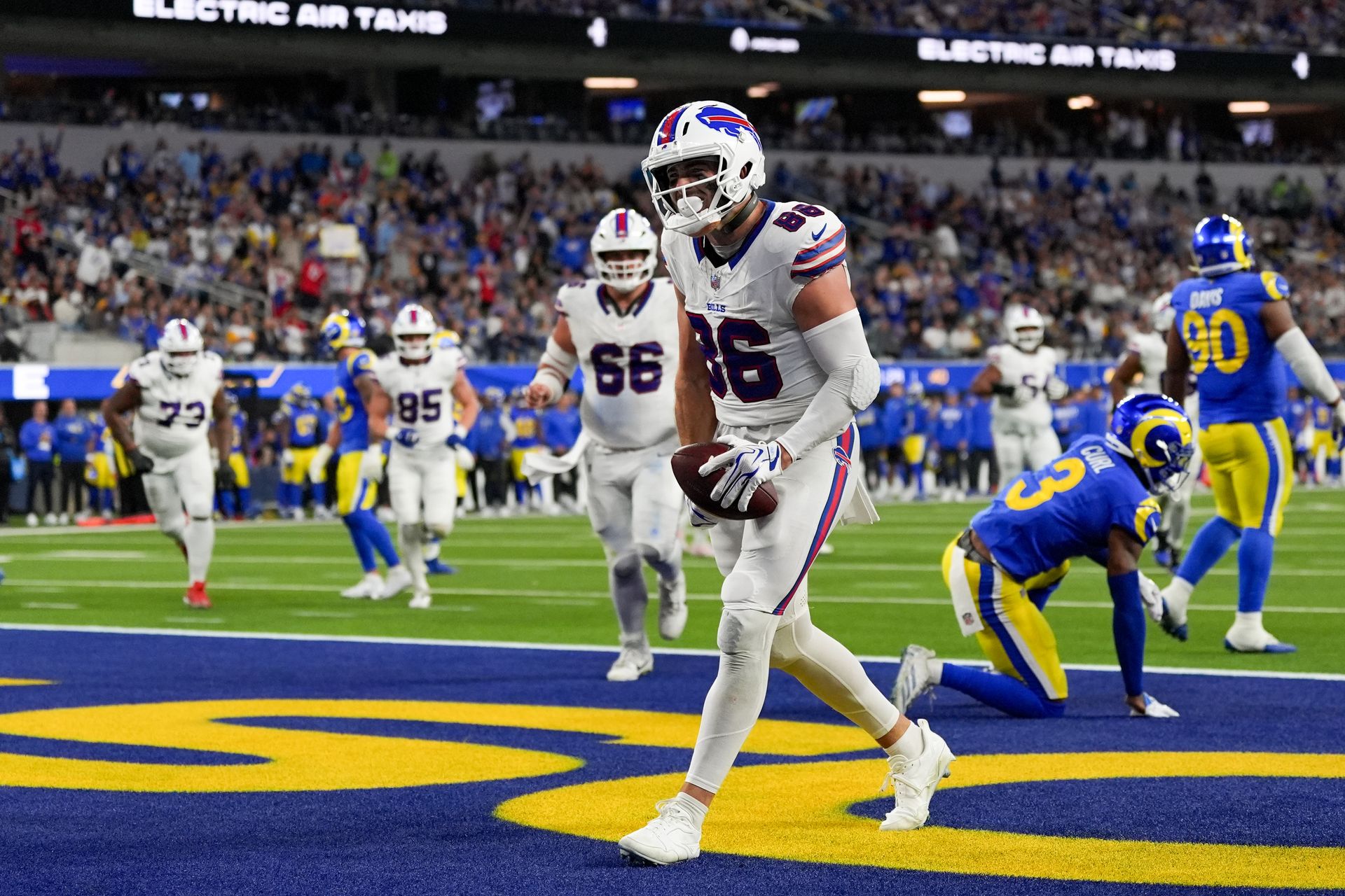 Dalton Kincaid Celebrates a Touchdown Reception