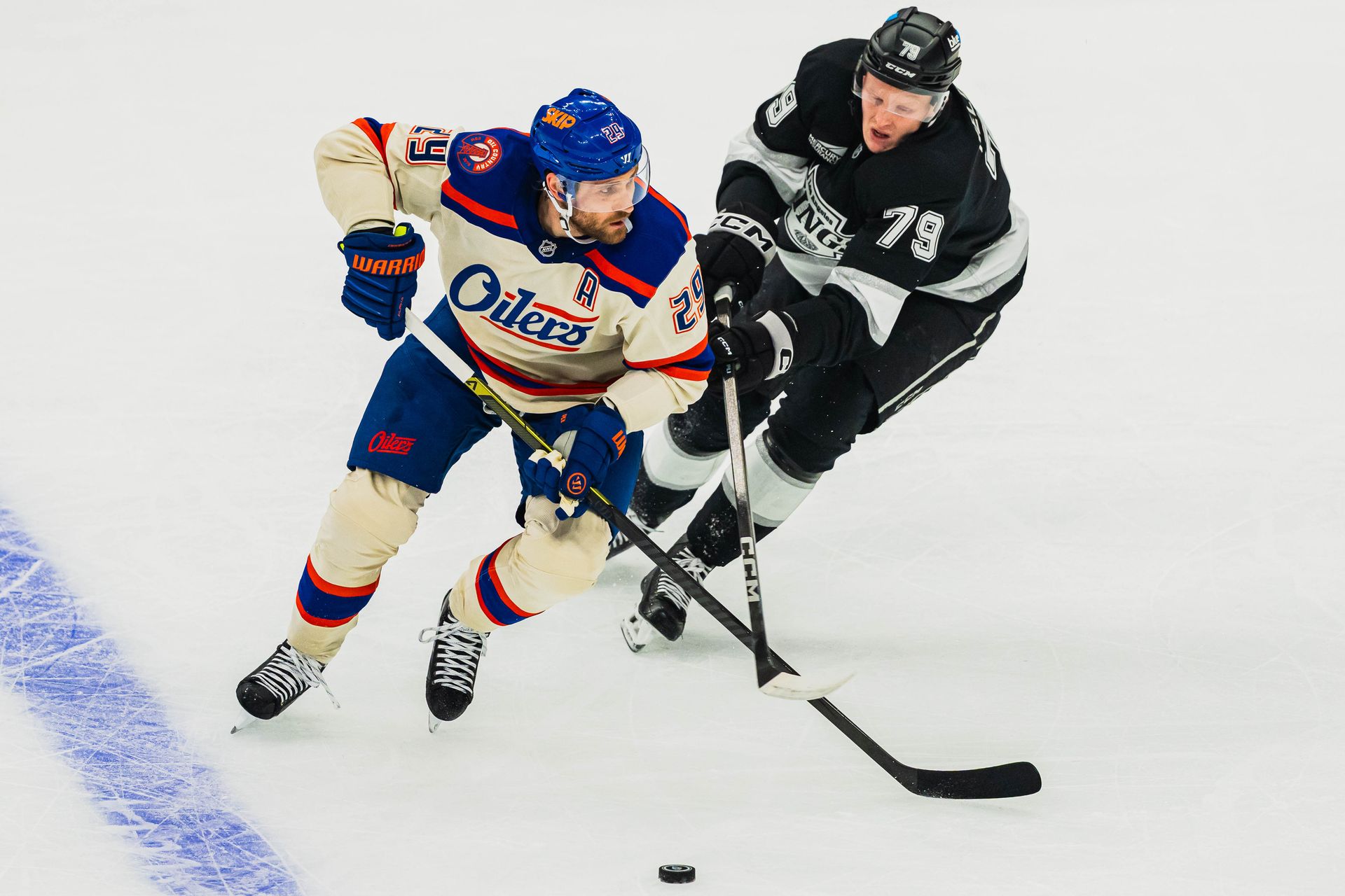 Samuel Helenius Battles to Steal the Puck