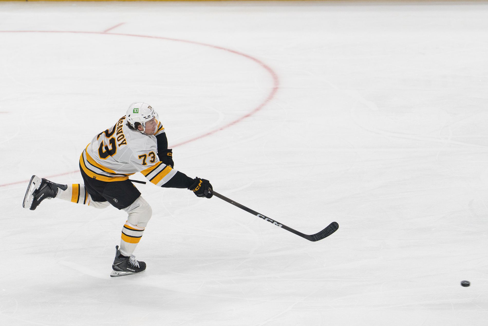 Charlie McAvoy takes a shot against the Kings