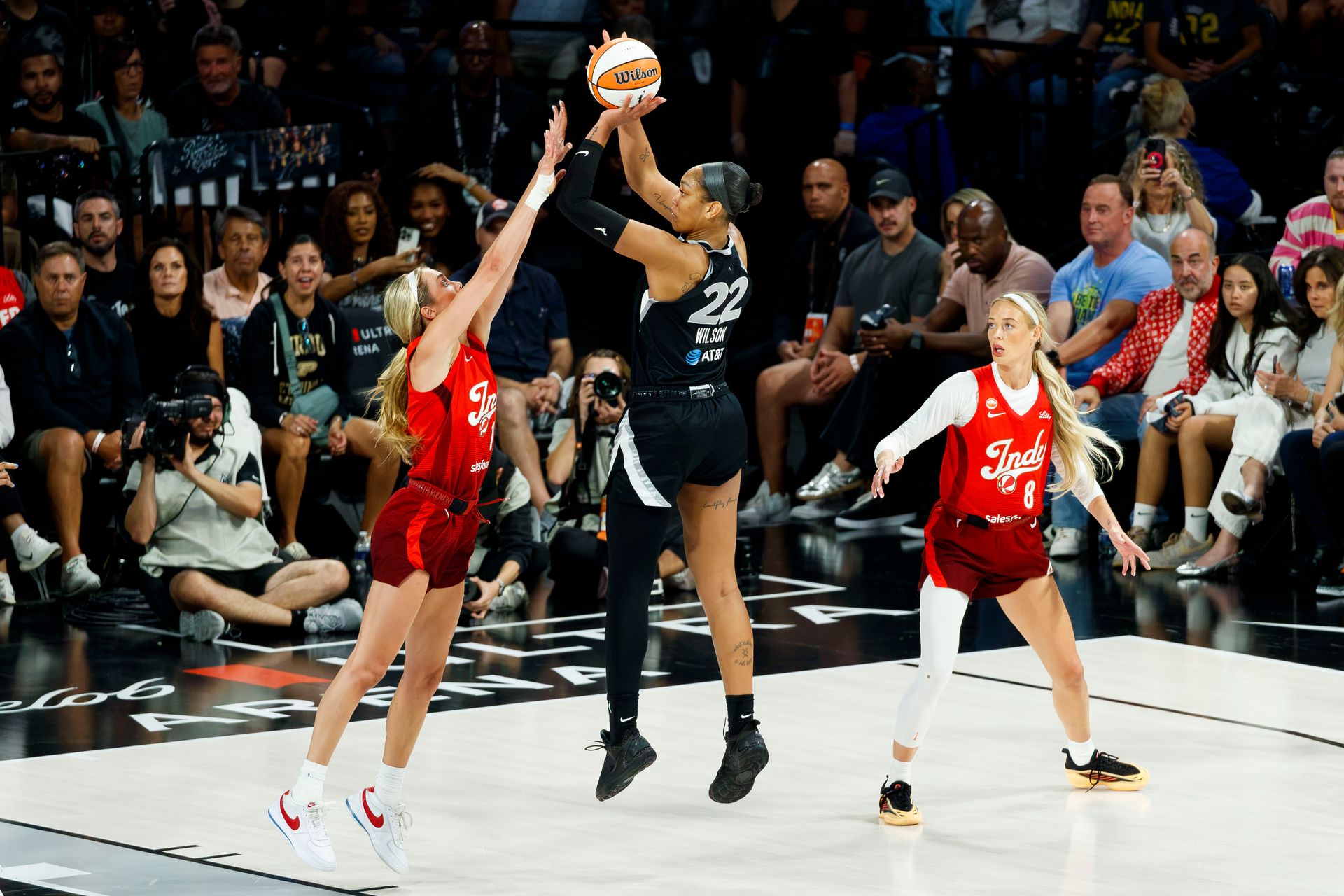 A'ja Wilson scores over Lexie Hull in WNBA Playoff
