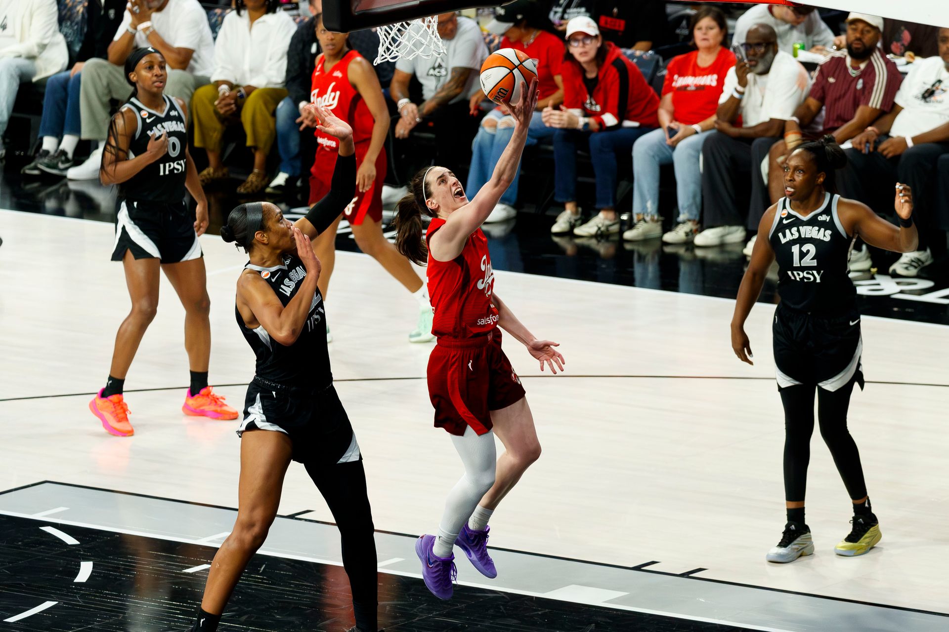 Caitlin Clark makes a layup in WNBA Playoff action