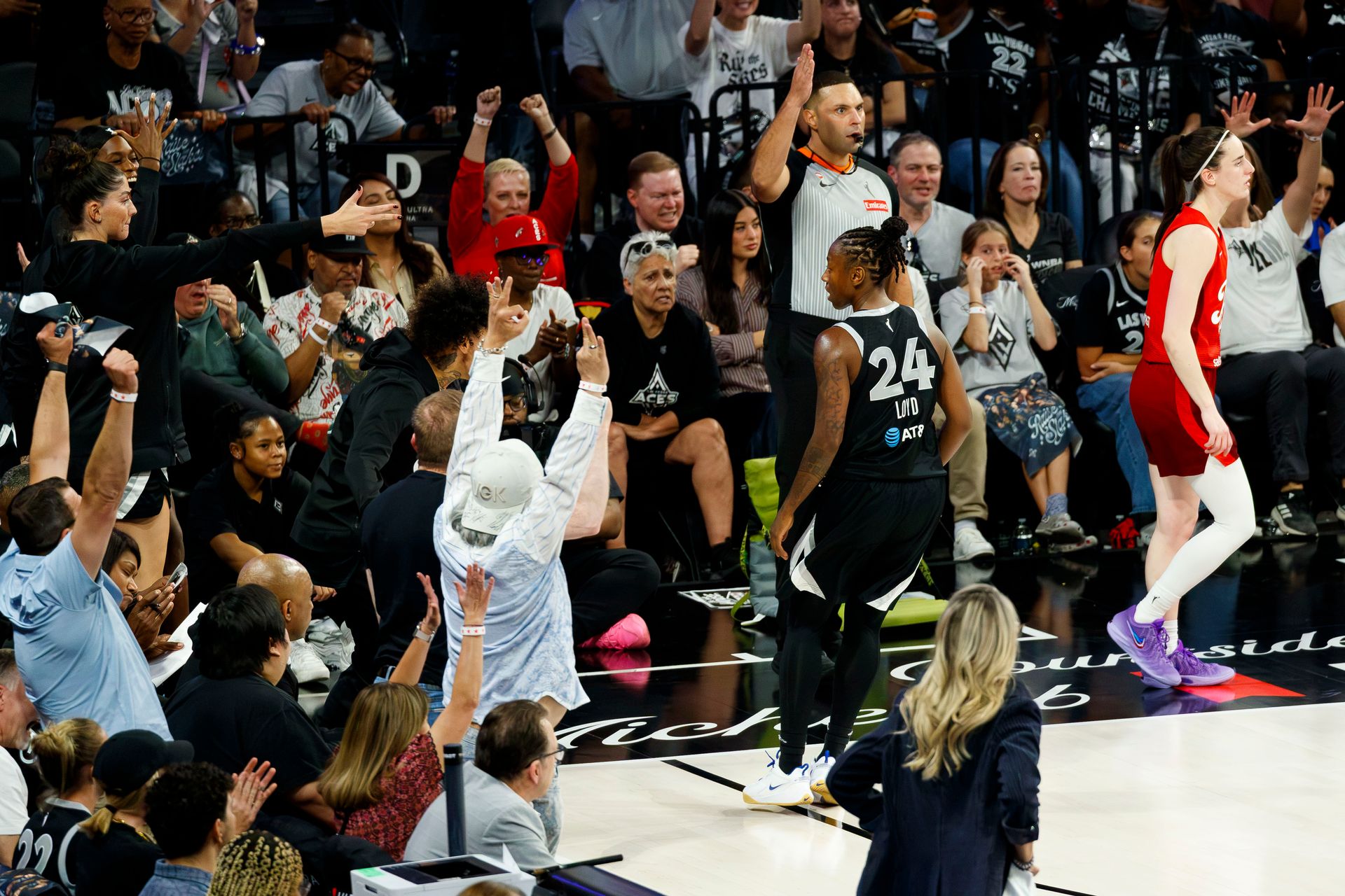 Jewell Loyd celebrates a three-pointer with Las Vegas fans