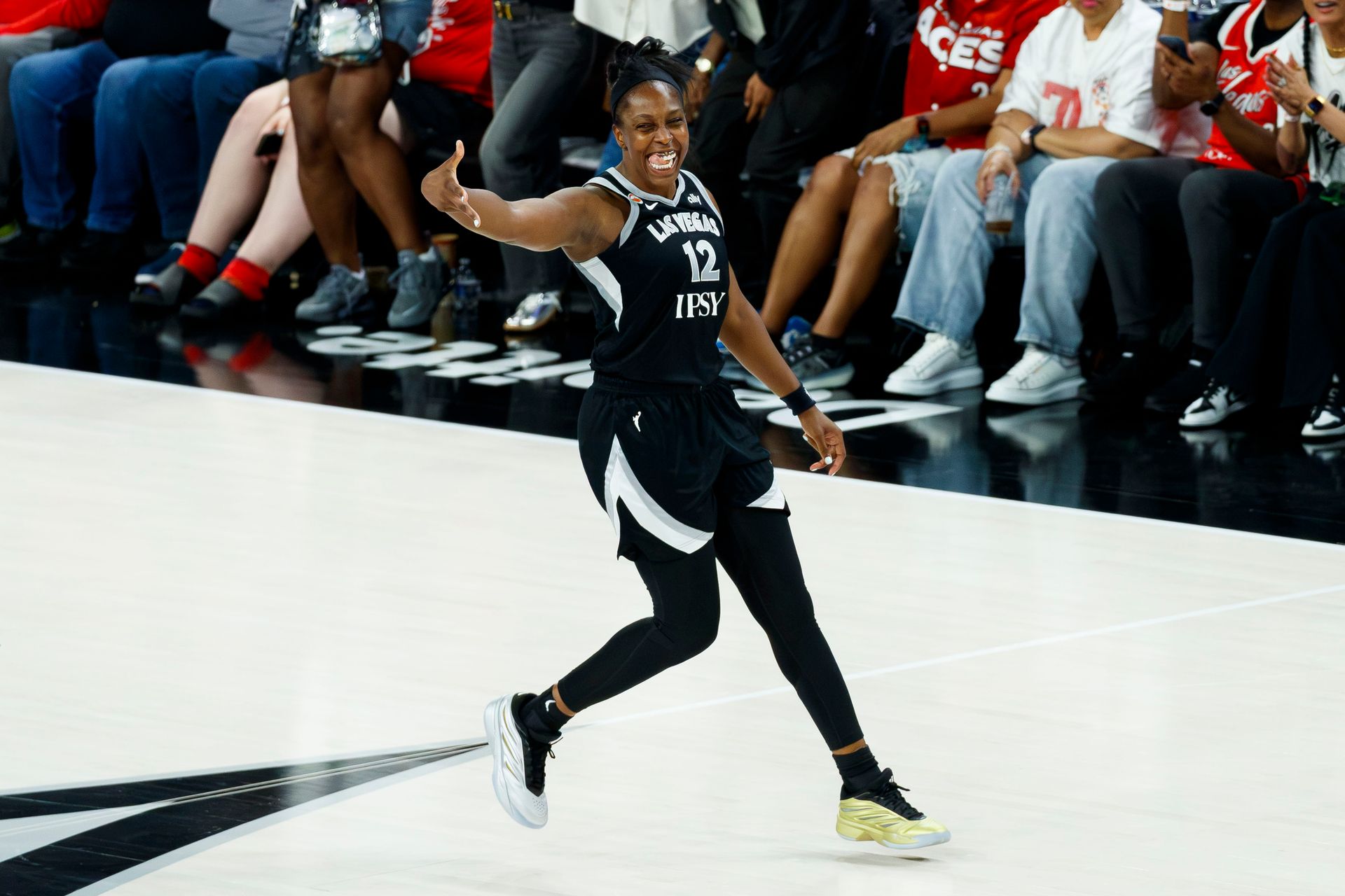 Chelsea Gray hits a three-pointer in playoff celebration