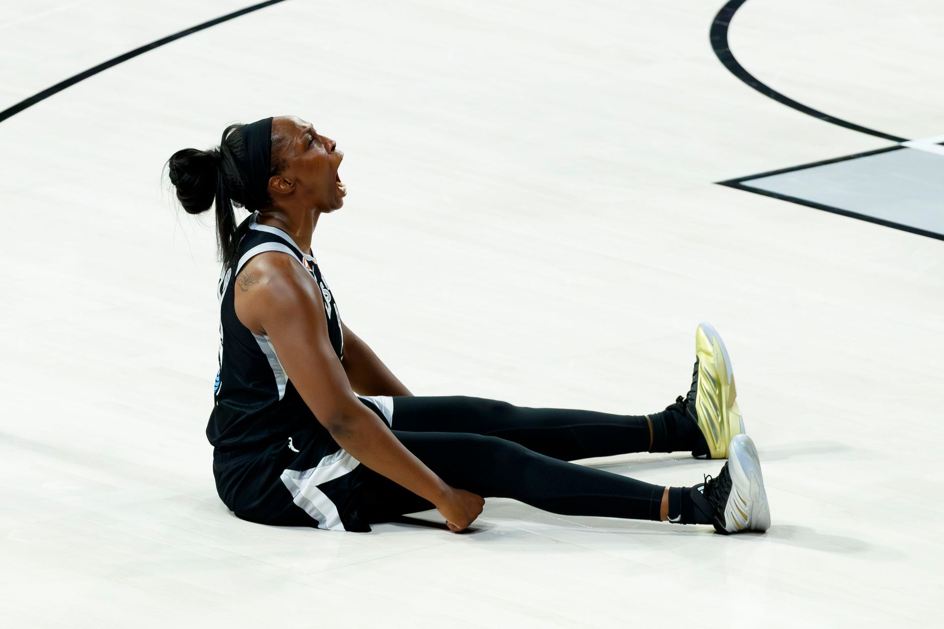 Chelsea Gray celebrates an and-one against Indiana Fever