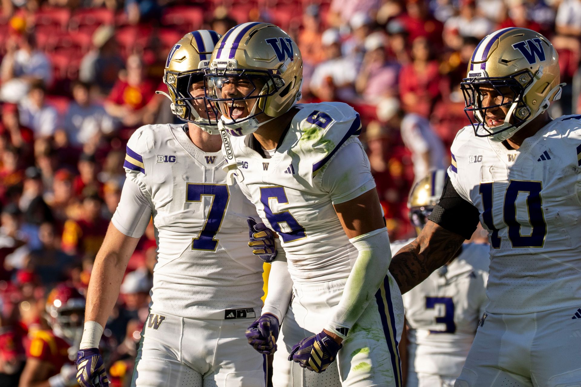 Dylan Robinson celebrates a pass break-up for Washington