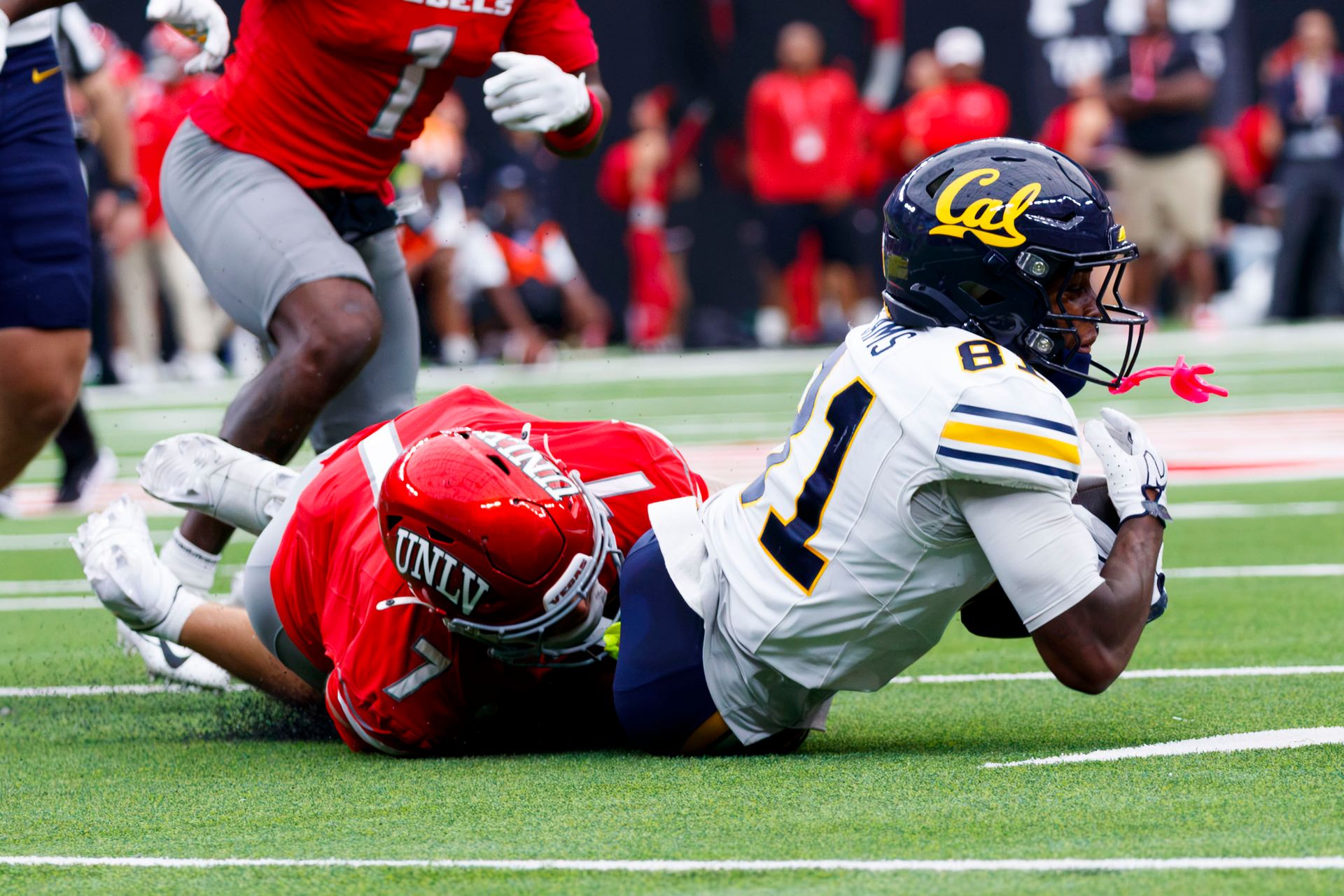 Jake Pope tackles Tyree Sams in a crucial second quarter play