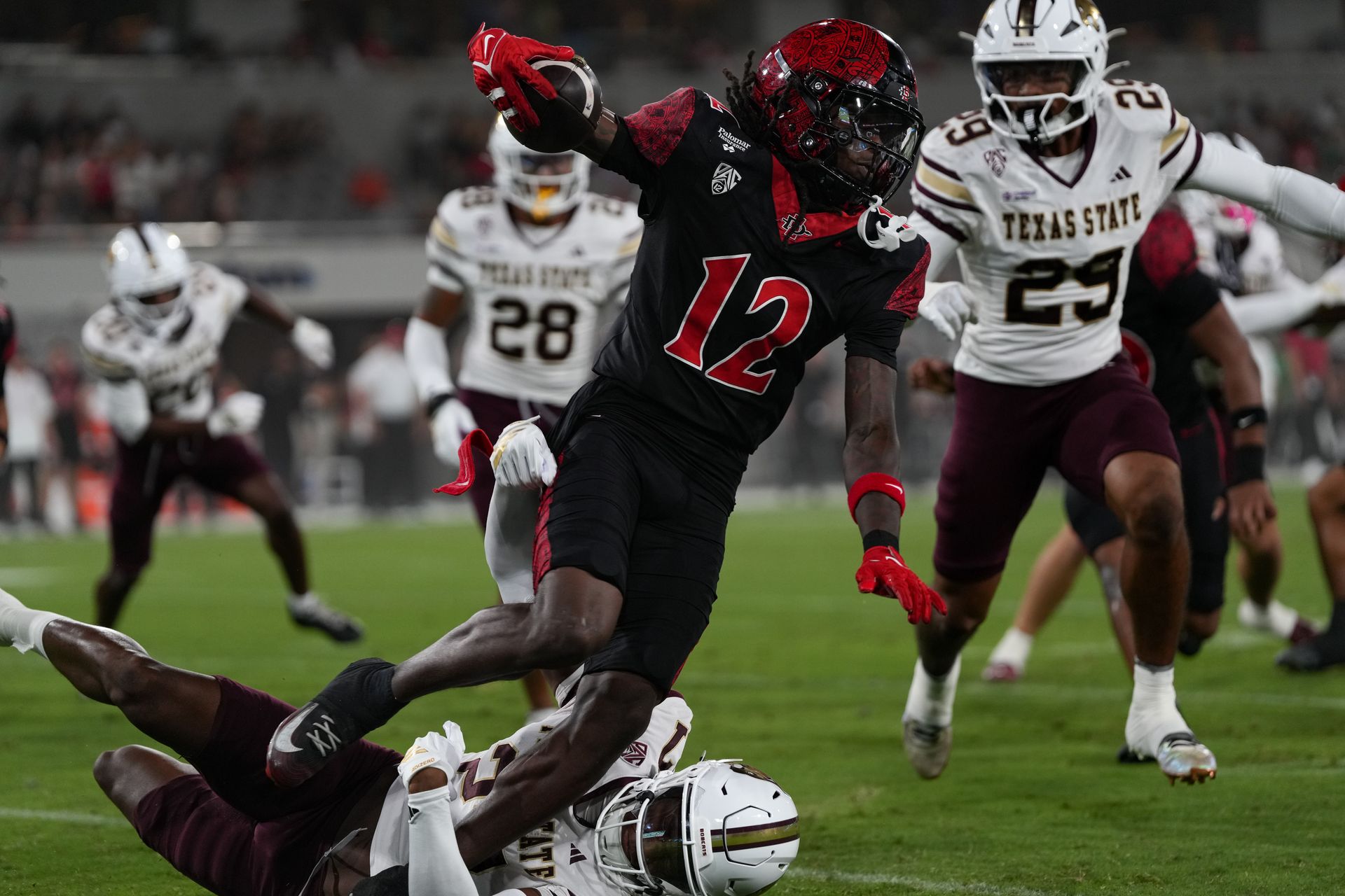 Jaylon Hawkins (12) dashes through TXST defense, NCAA game, Oct 03, 2026