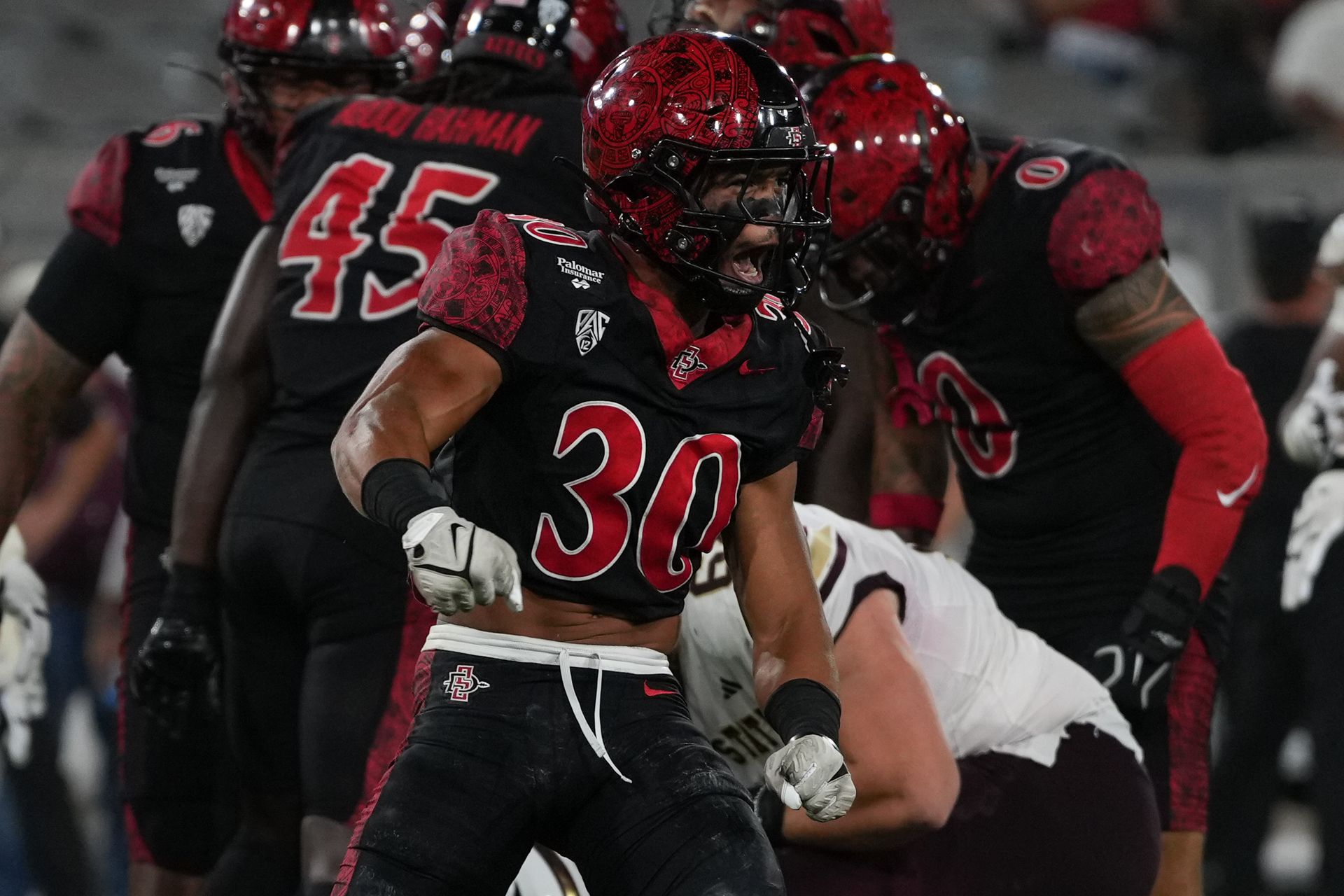 Jalen Thomeson (30) celebrates a tackle, NCAA game, Oct 03, 2026