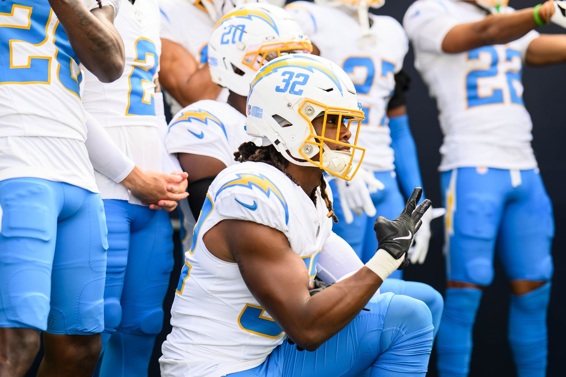 Kendall Williamson with Chargers team before the NFL game at Lumen Field