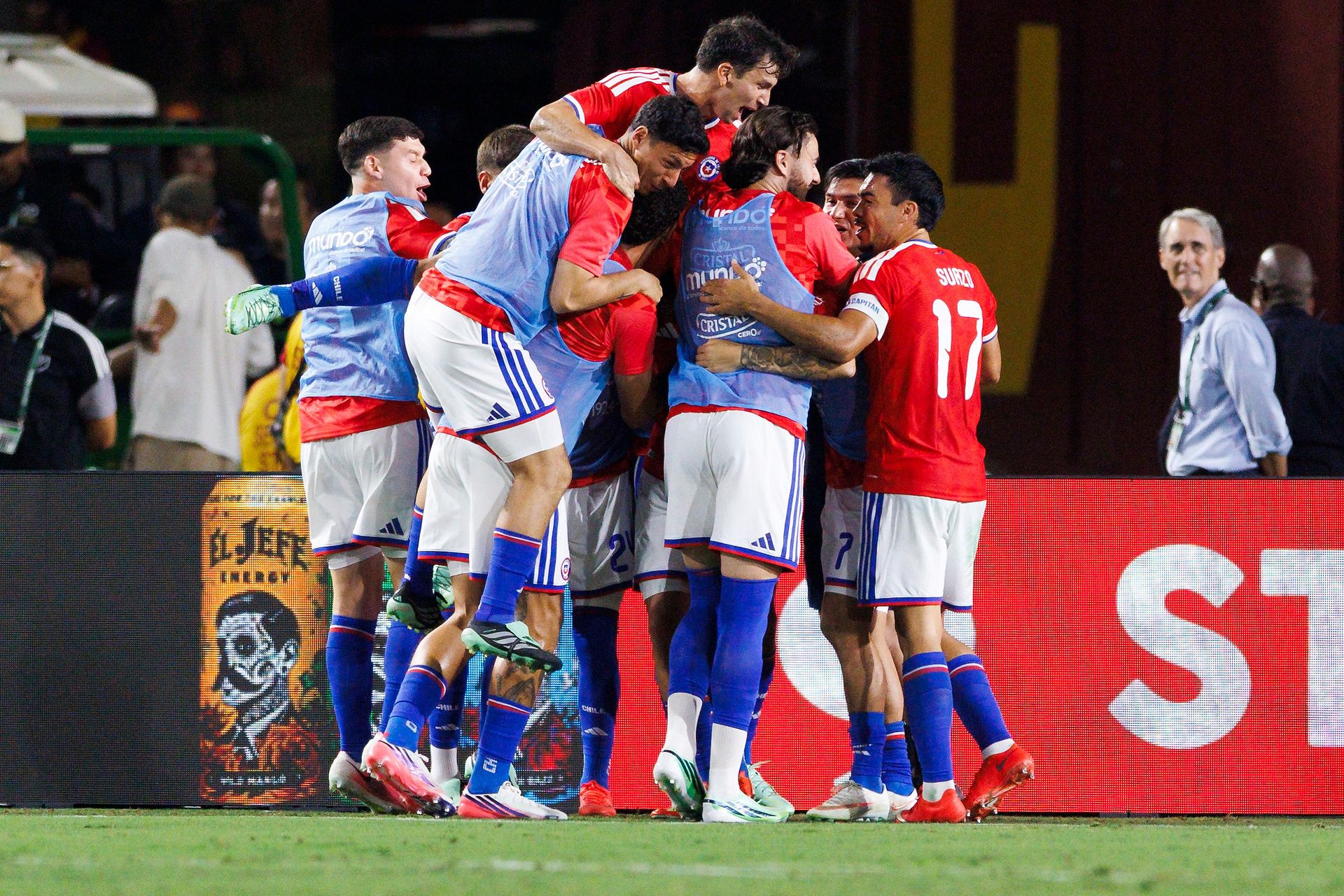 Chile celebrates a goal against Mexico