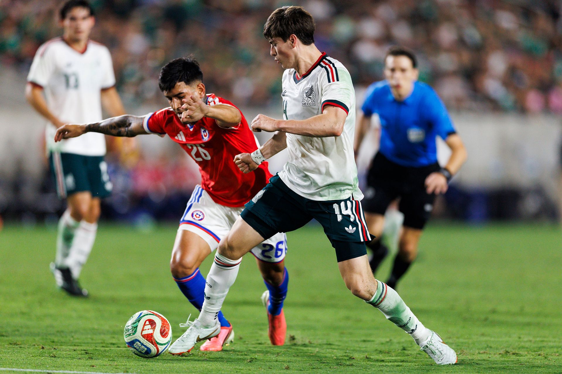 Armando Gonzalez kicks the ball in match against Chile