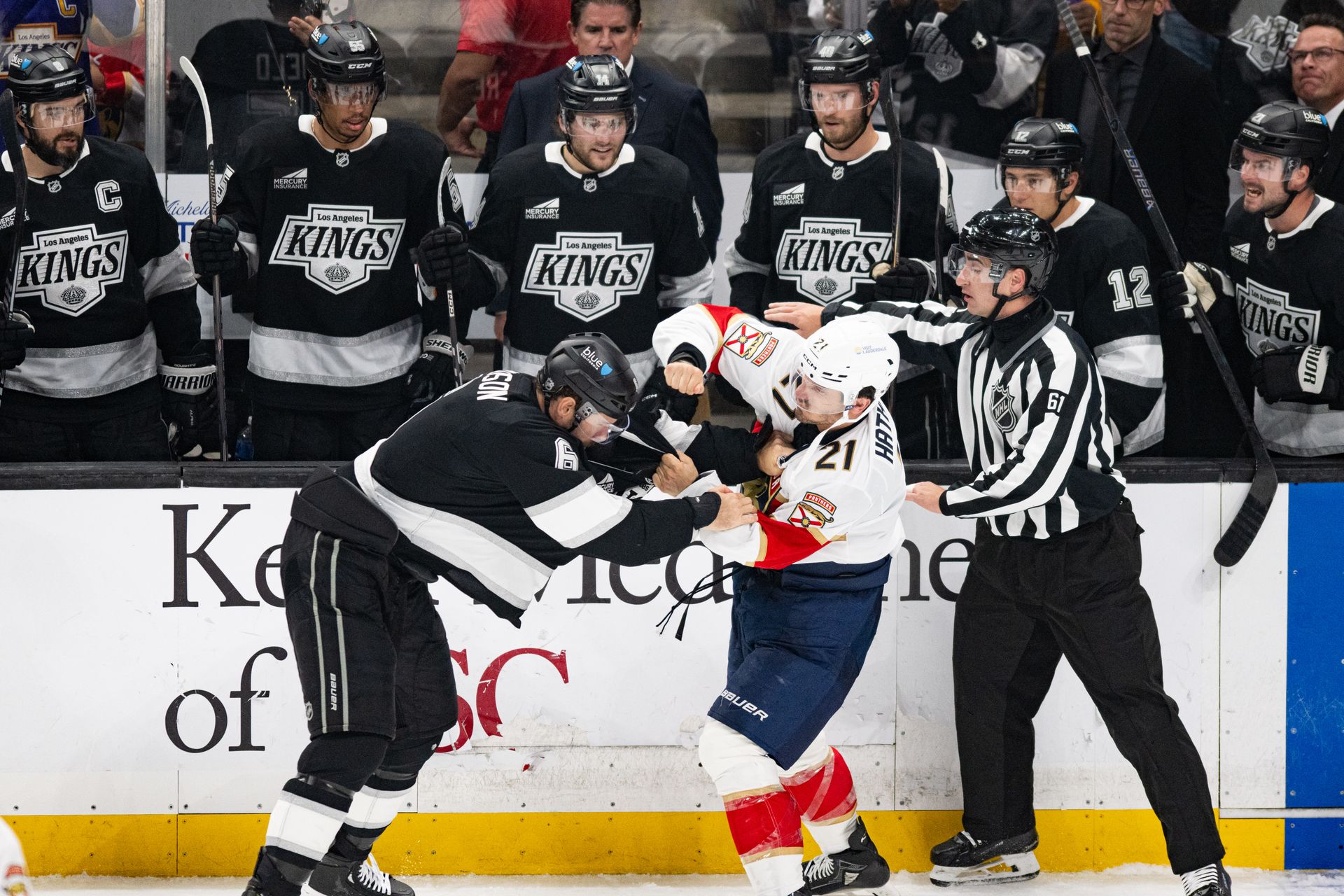 Joel Edmundson exchanges punches with Garnet Hathaway.