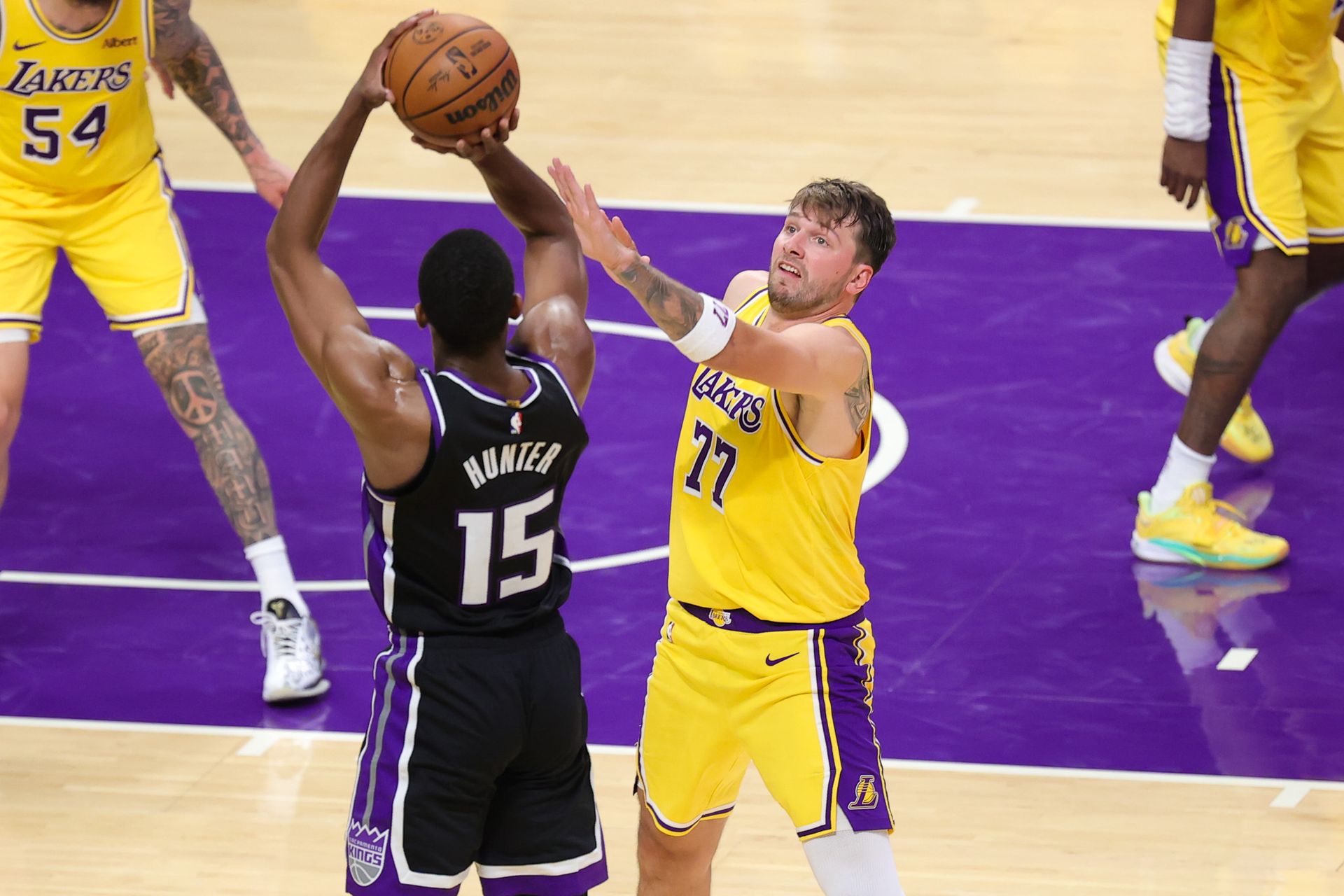 Luka Doncic contests a shot against the Kings