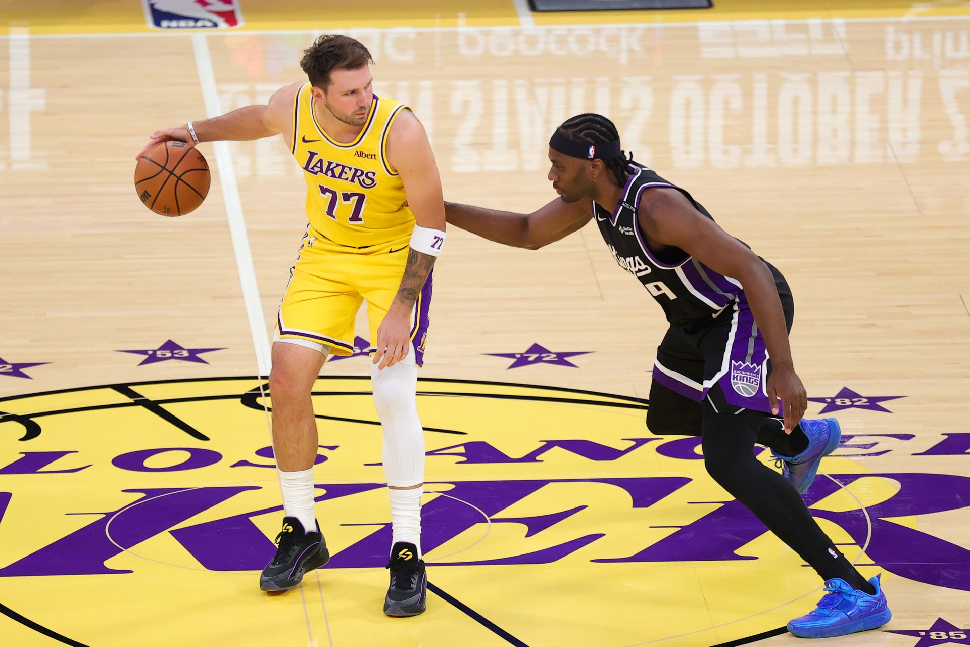 Luka Doncic dribbles against Sacramento