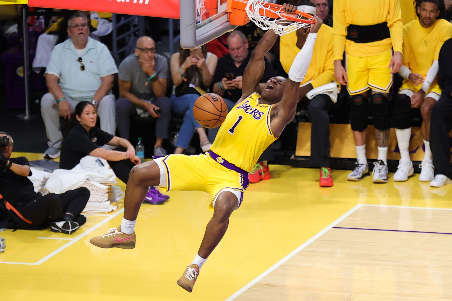 Adou Thiero dunks the ball in the game