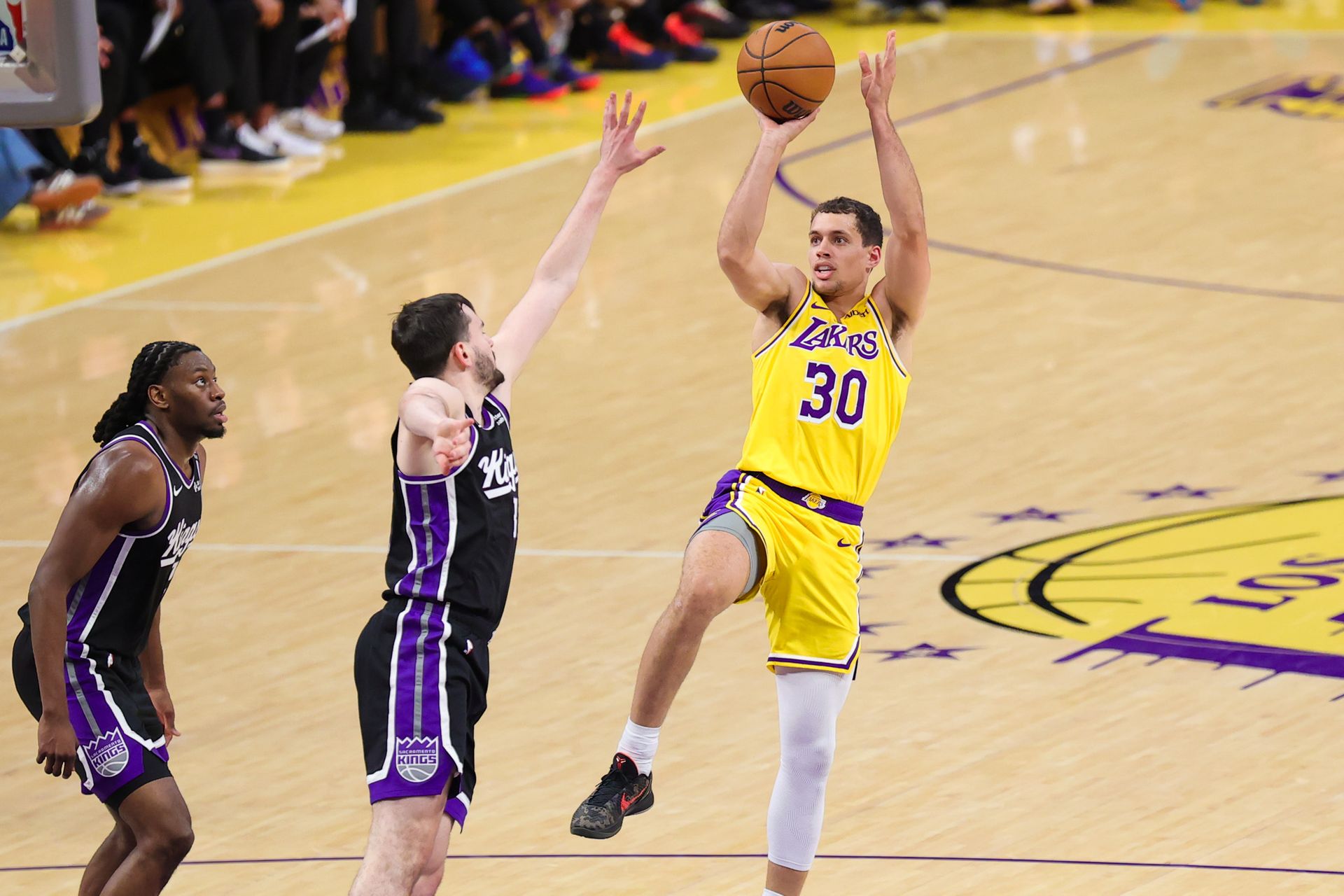 Chris Manon shooting during the NBA game