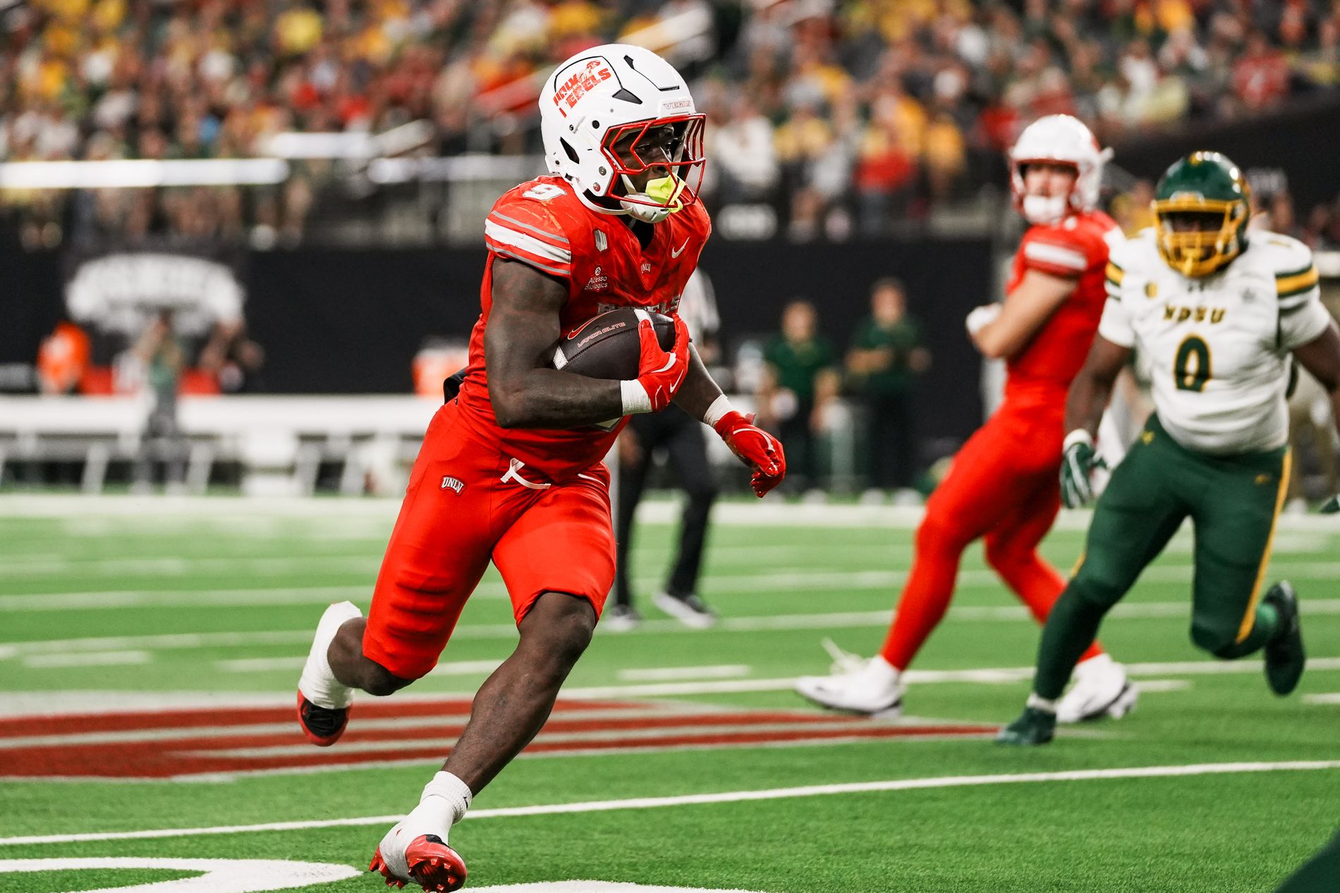 Jai’Den Thomas rushes downfield in the second half.