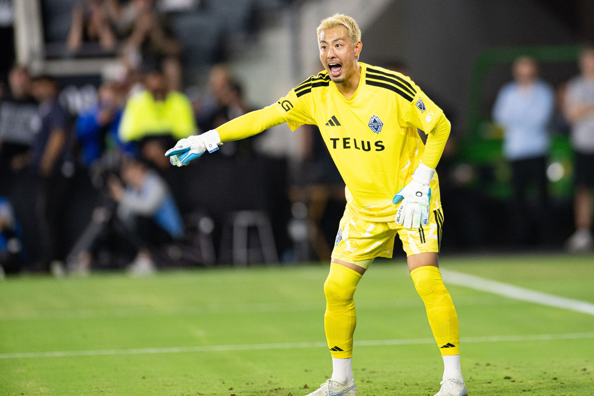 Whitecaps' Yohei Takaoka (1) calls out during the game