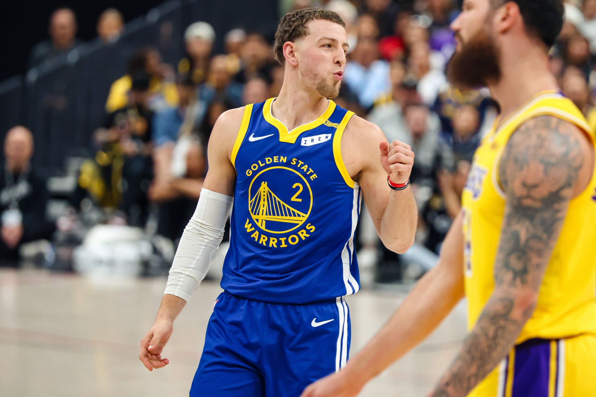 Brandin Podziemski celebrates a basket against the Lakers