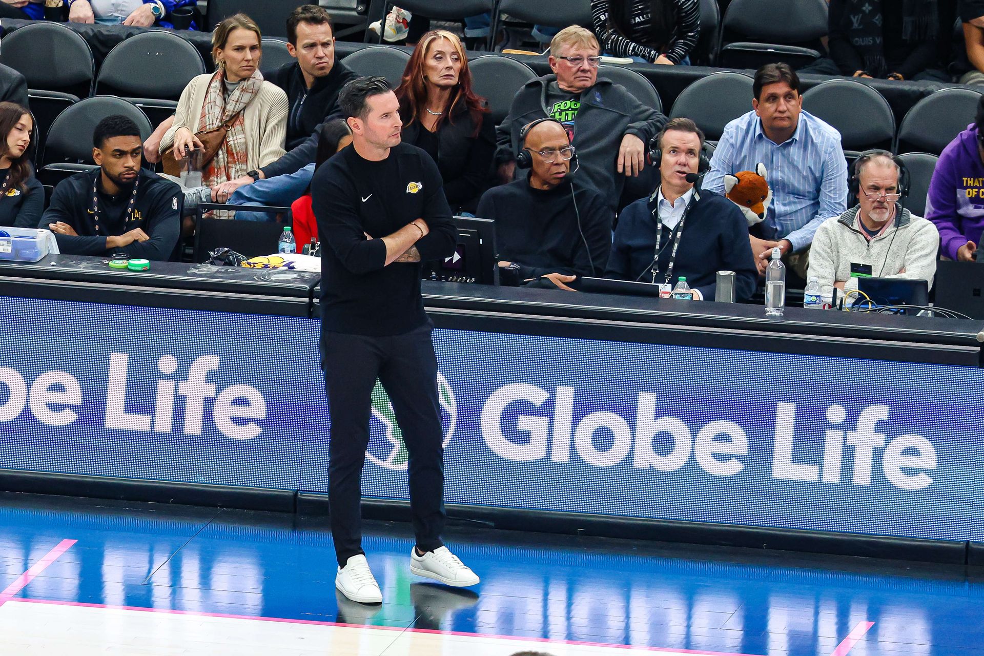 JJ Redick watches the Lakers face the Warriors