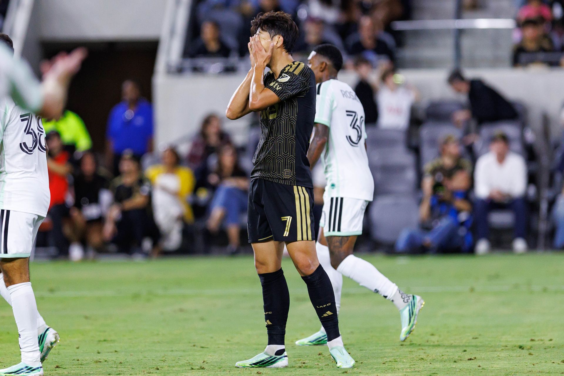 Son Heung-Min reacts after missing a goal attempt