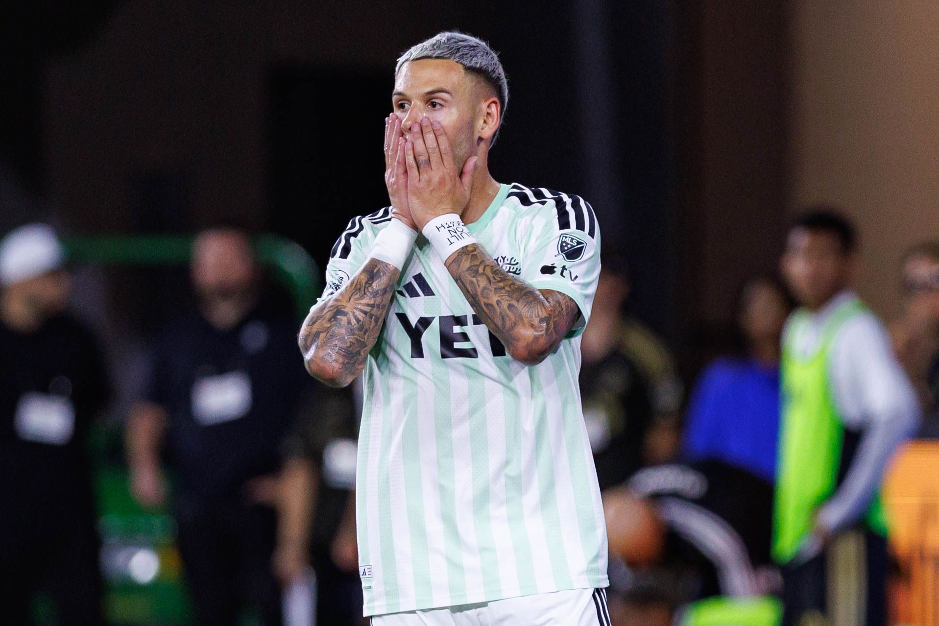 Christian Ramirez reacts after missing a goal attempt