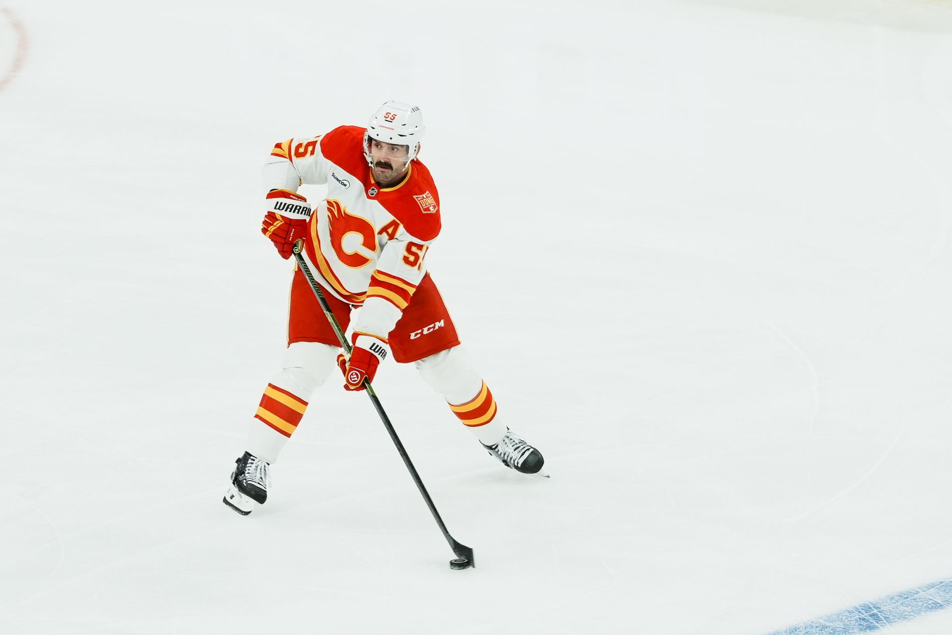 Jacob Middleton controls the puck for Calgary