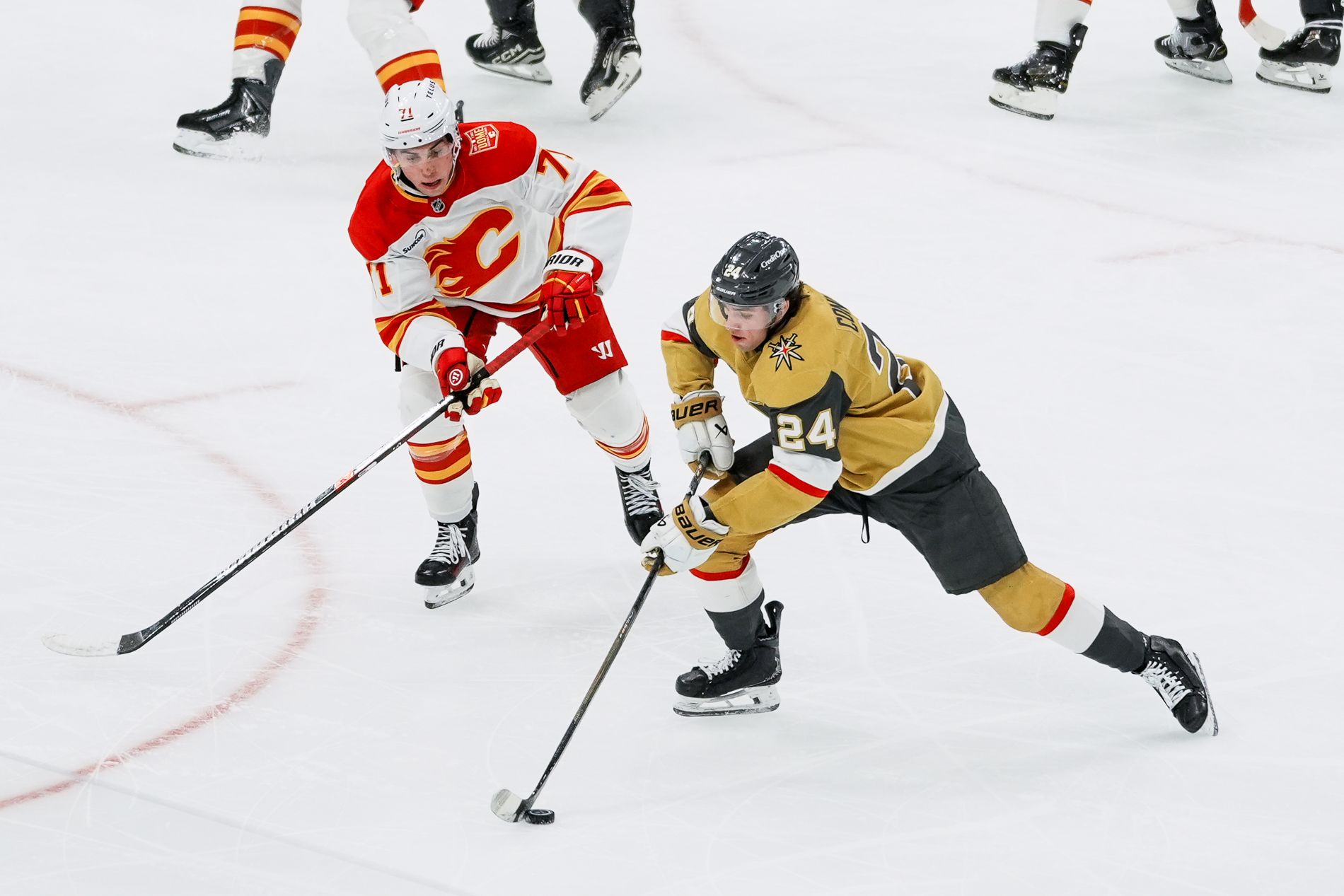 Trevor Connelly carries the puck past Simon Nemec