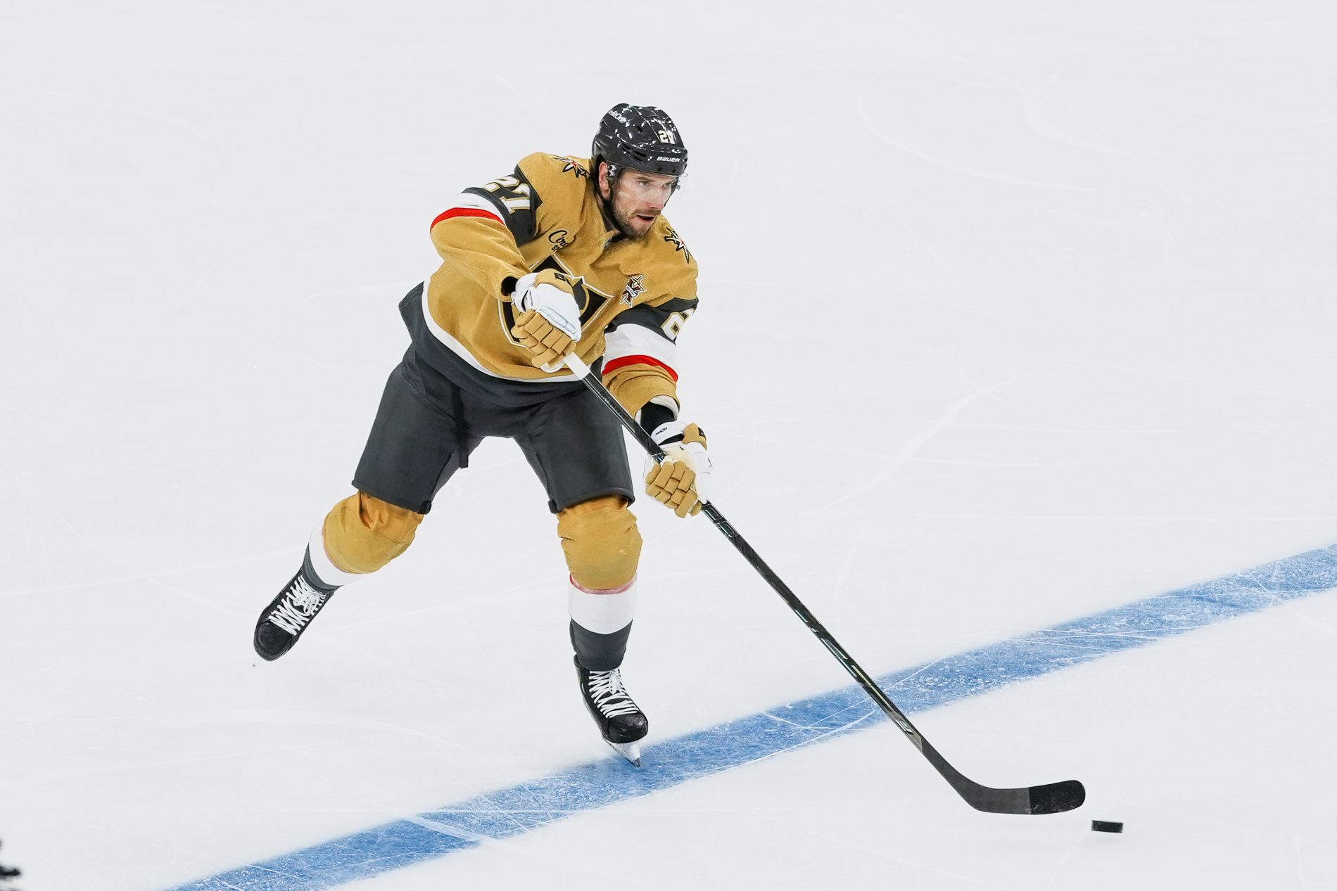 Shea Theodore passes the puck in the second period