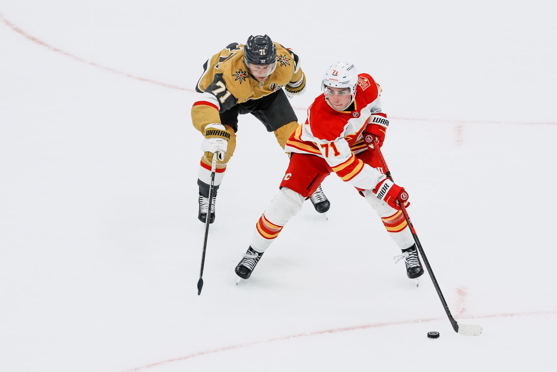 Simon Nemec advances the puck ahead of William Karlsson