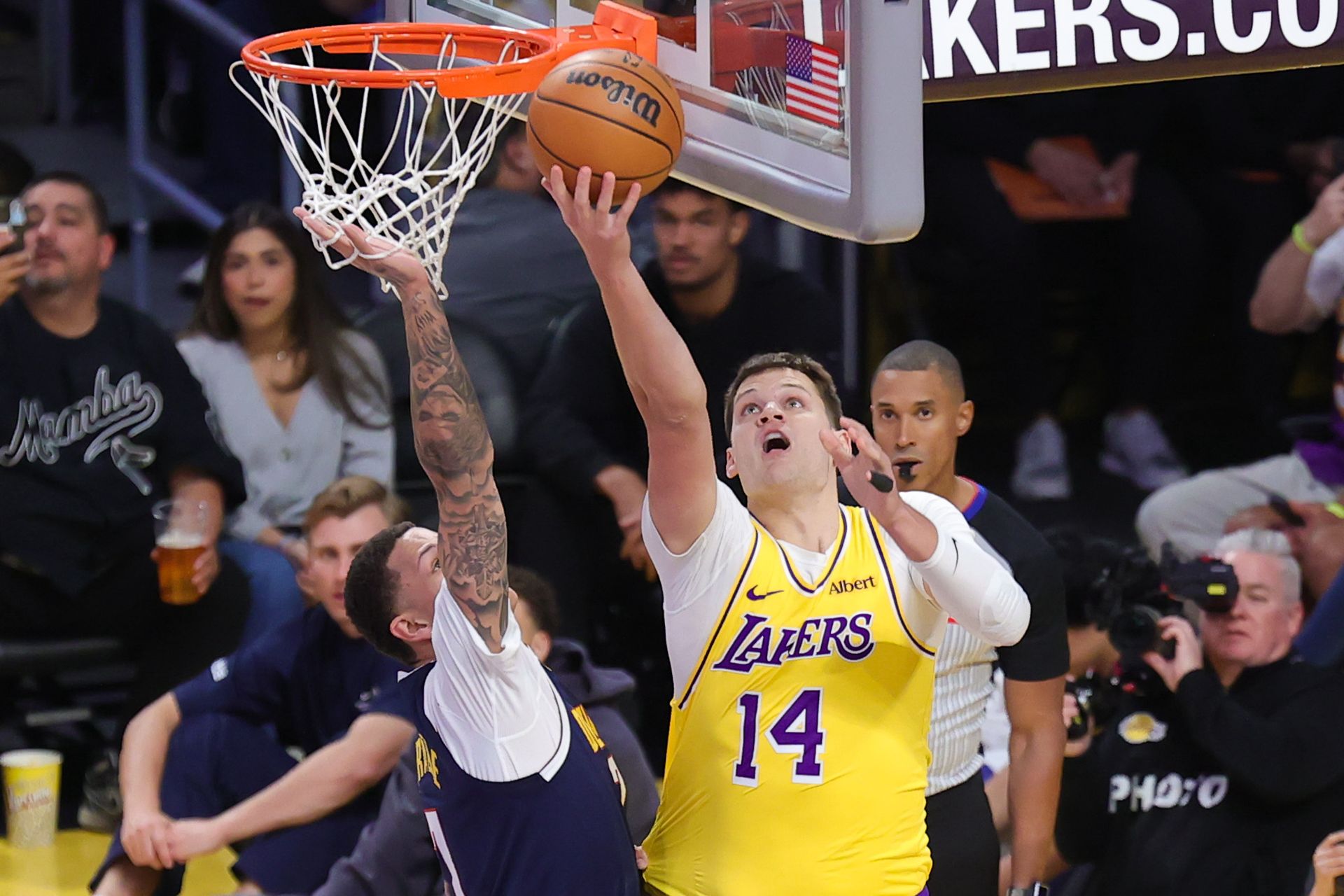 Walker Kessler finishes a layup against Denver