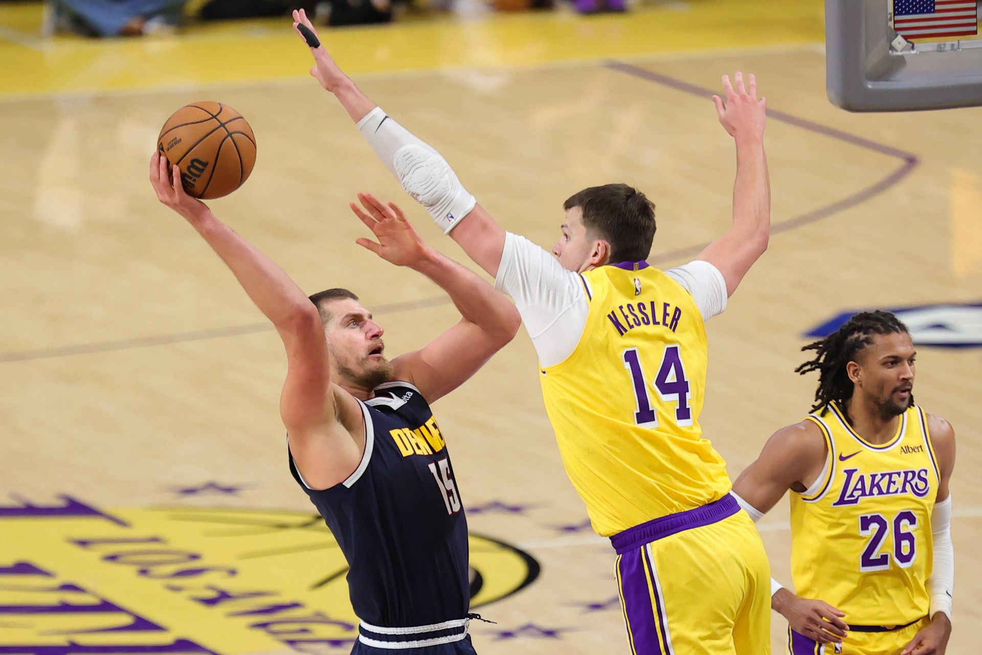 Walker Kessler guards Nikola Jokic