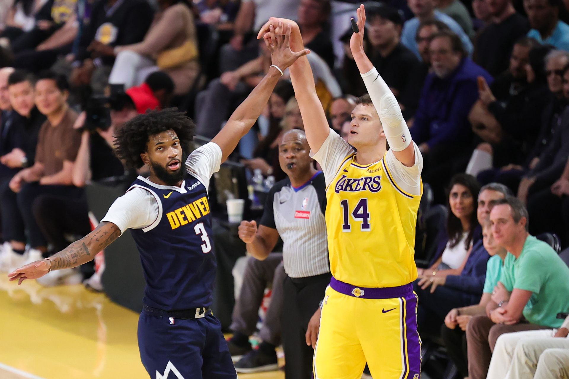 Walker Kessler takes a jump shot