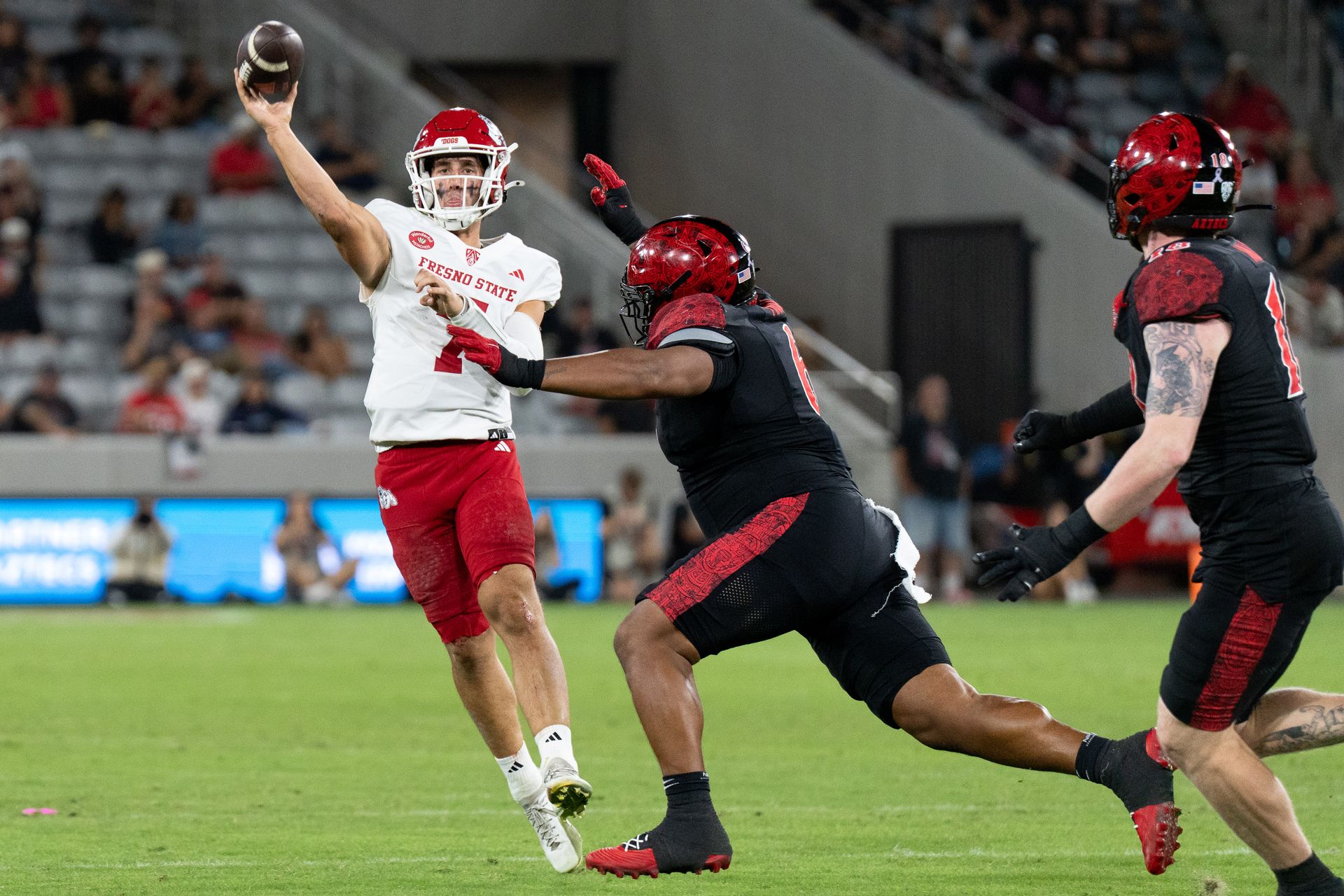 Jayden Mandal throws the ball away under pressure