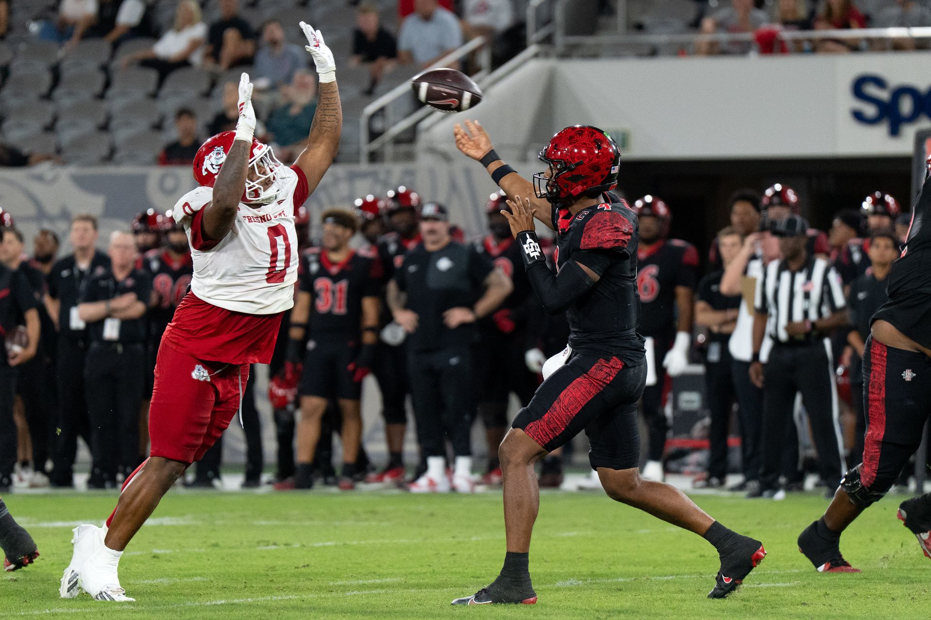 Jayden Denegal delivers a pass against Fresno State