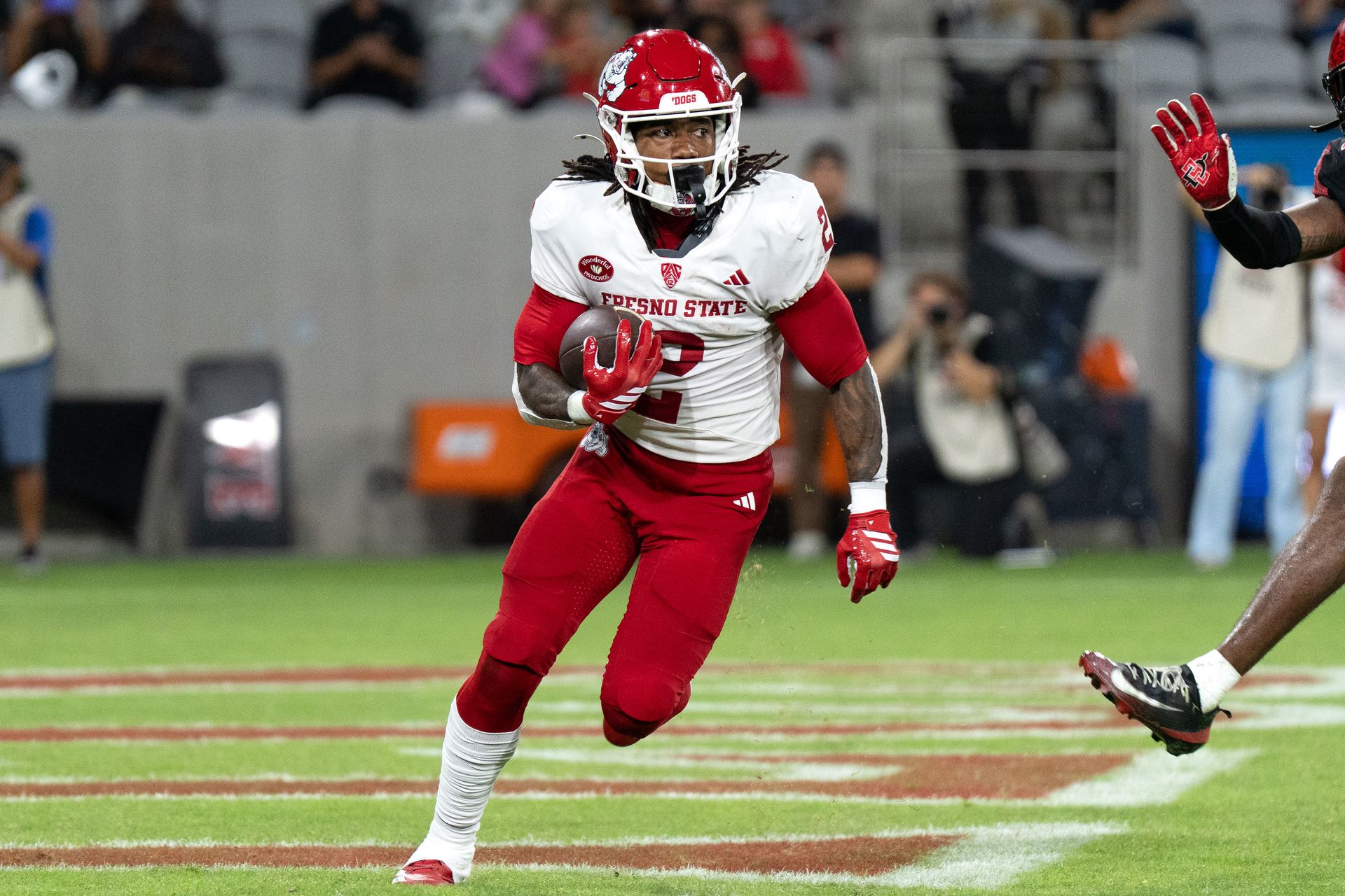 Rayshon Luke carries the ball upfield