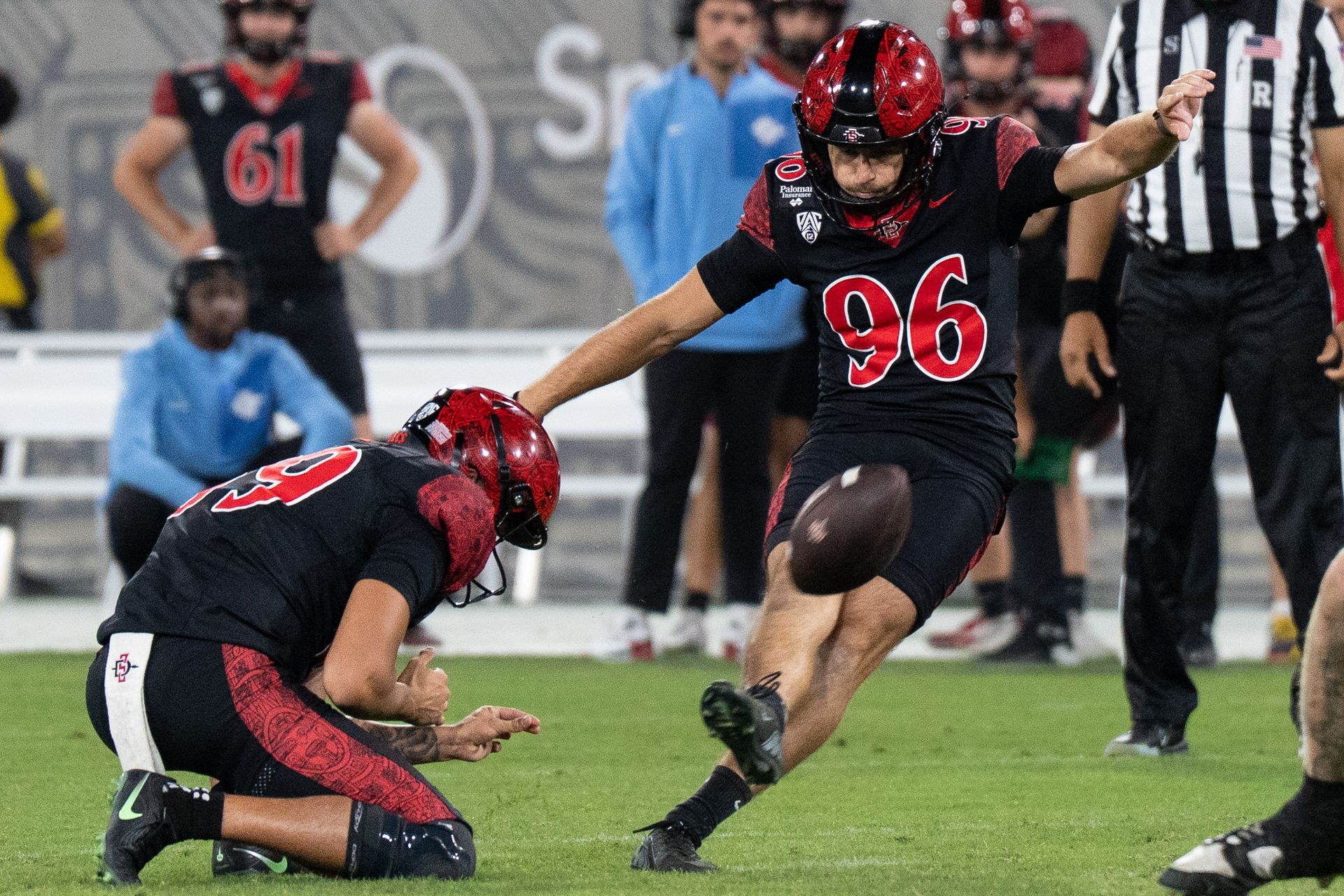 Cooper DiLeva kicks a field goal against Fresno State