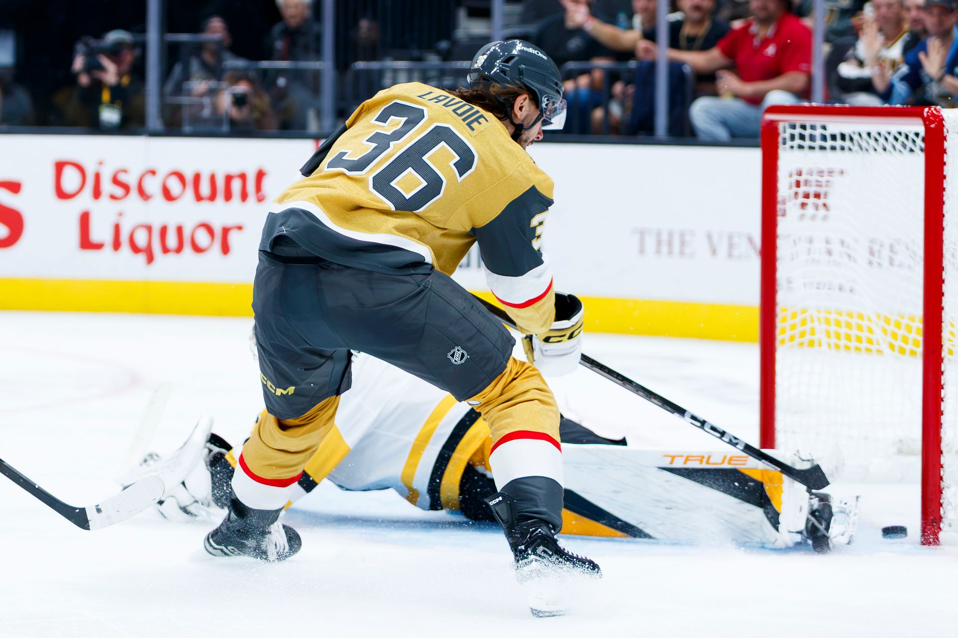 Raphael Lavoie attempts to score against Sergei Murashov
