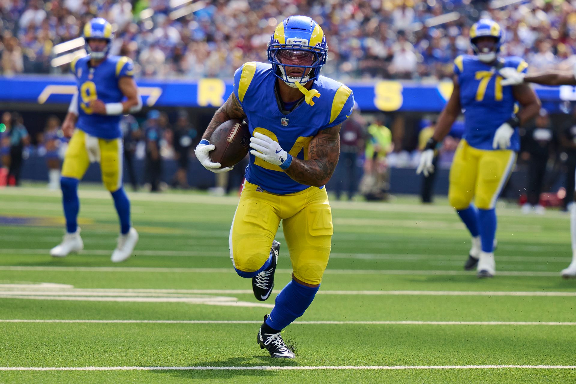 Blake Corum runs for a touchdown against the Cardinals