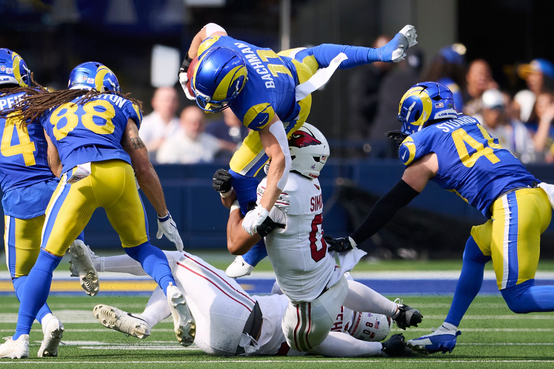 Alex Bachman leaps during the Rams-Cardinals game