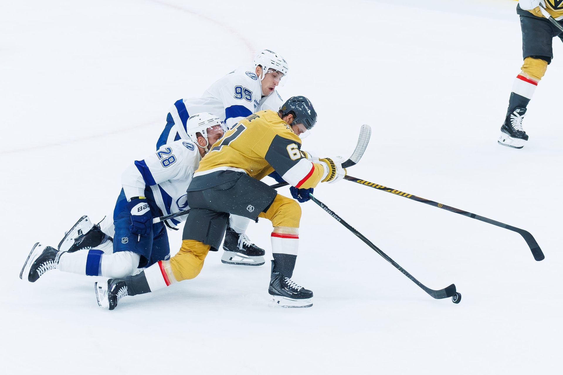 Mark Stone battles for possession against Tampa Bay
