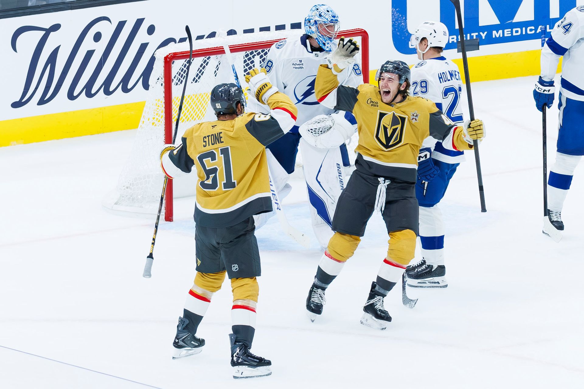 Mark Stone and Braeden Bowman celebrate the tying goal