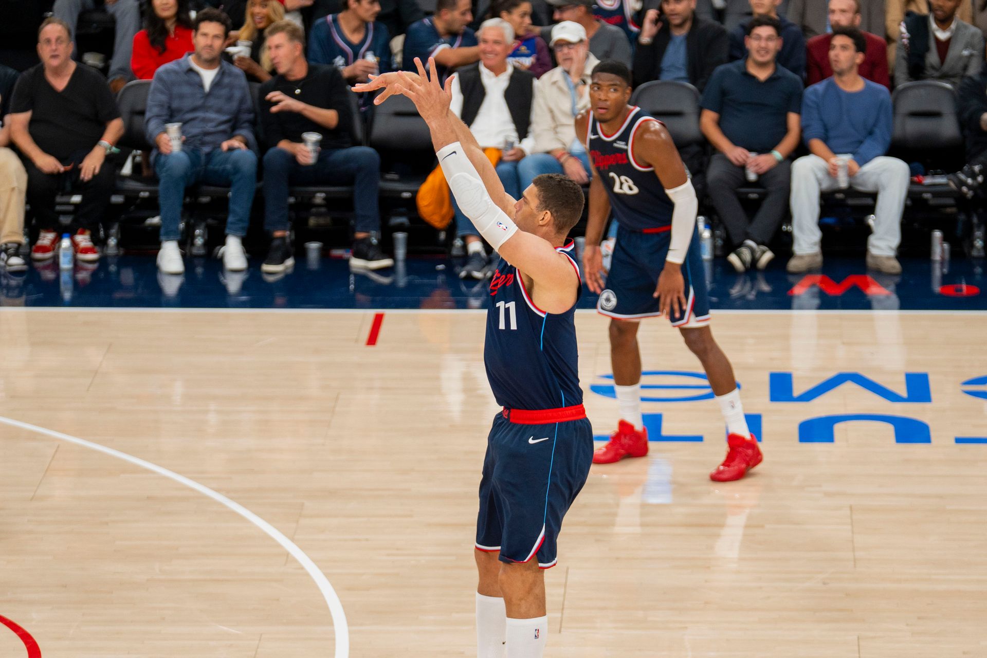 Brook Lopez makes a three-pointer against Sacramento