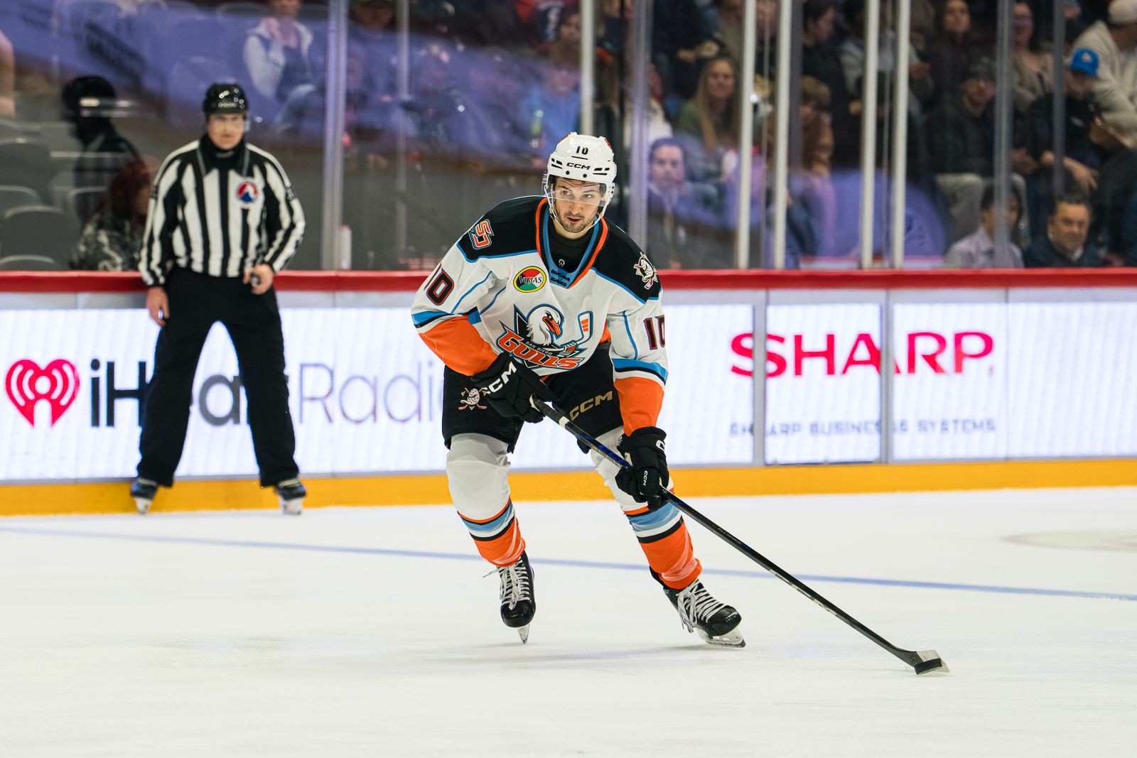 Travis Mitchell carries the puck up the ice