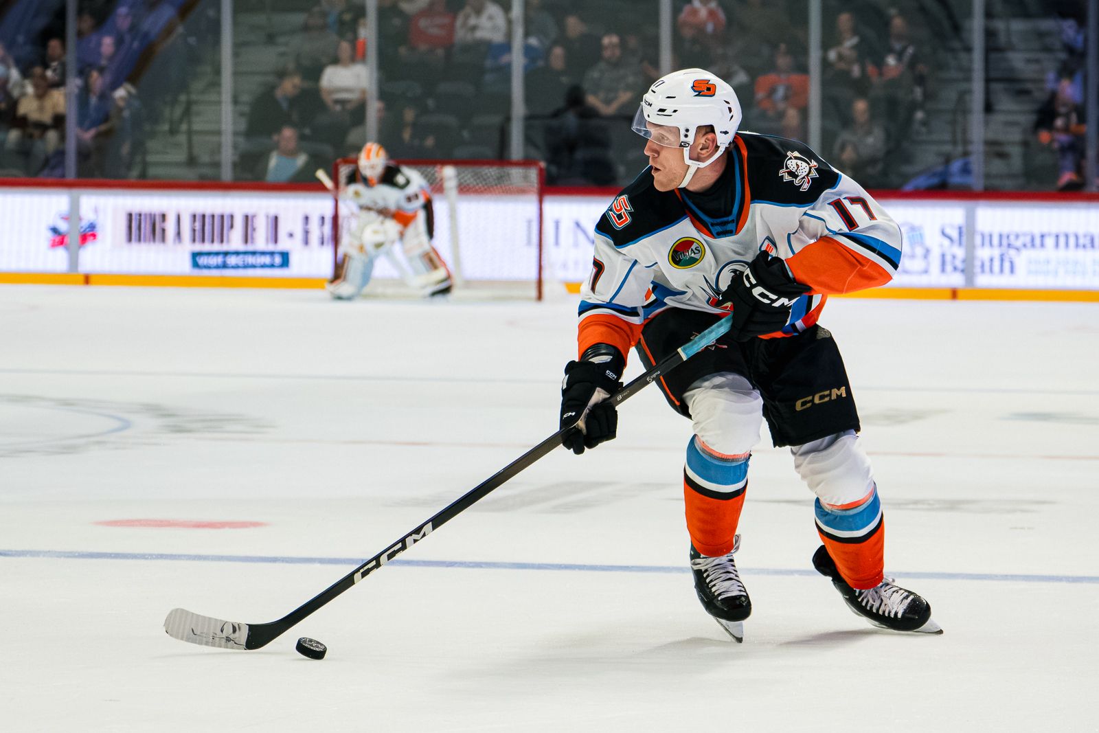 Nathan Gaucher moves the puck up the ice